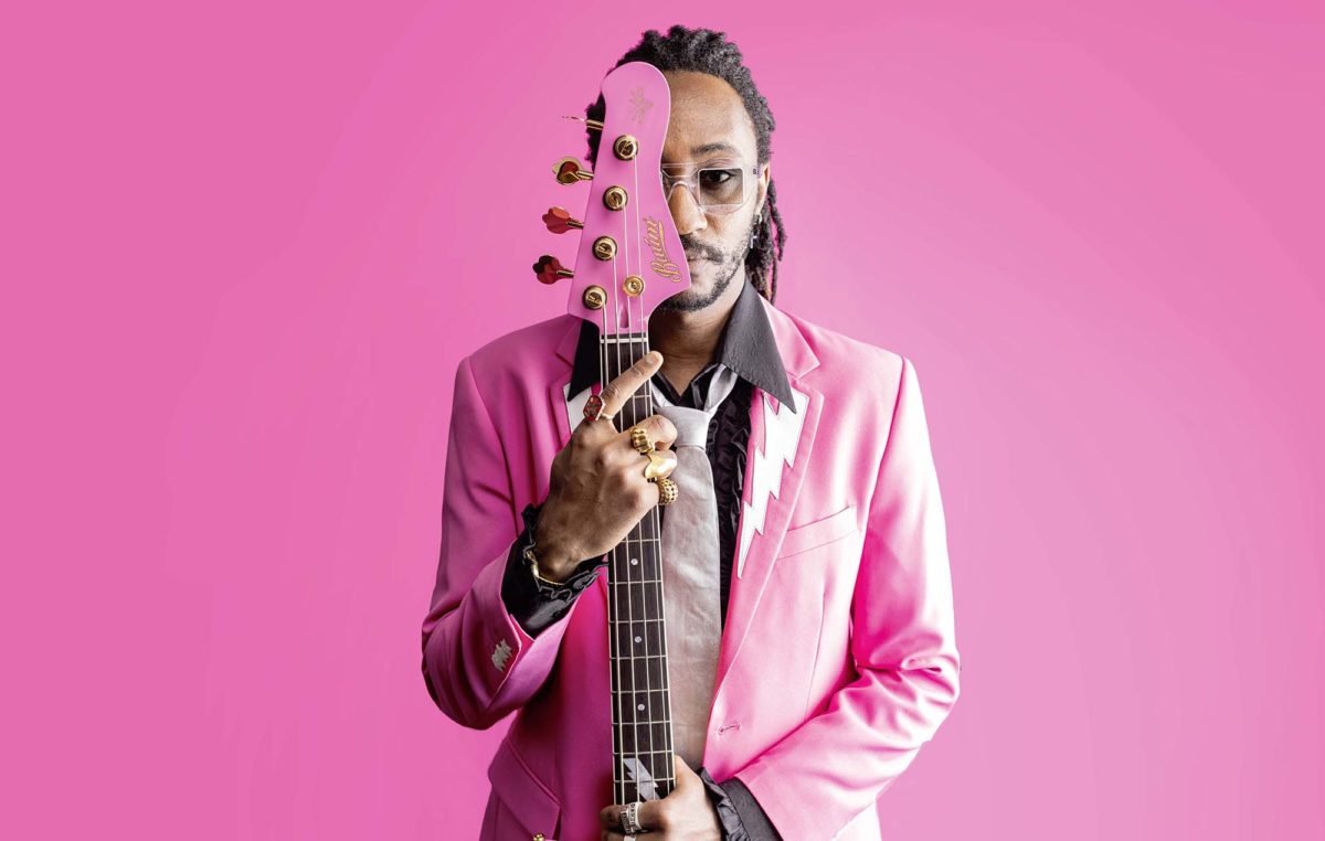 Seye-Adelekan-with-Baum-Guitars-Signature-Pink-Thunder-Bass-1200x762.jpg