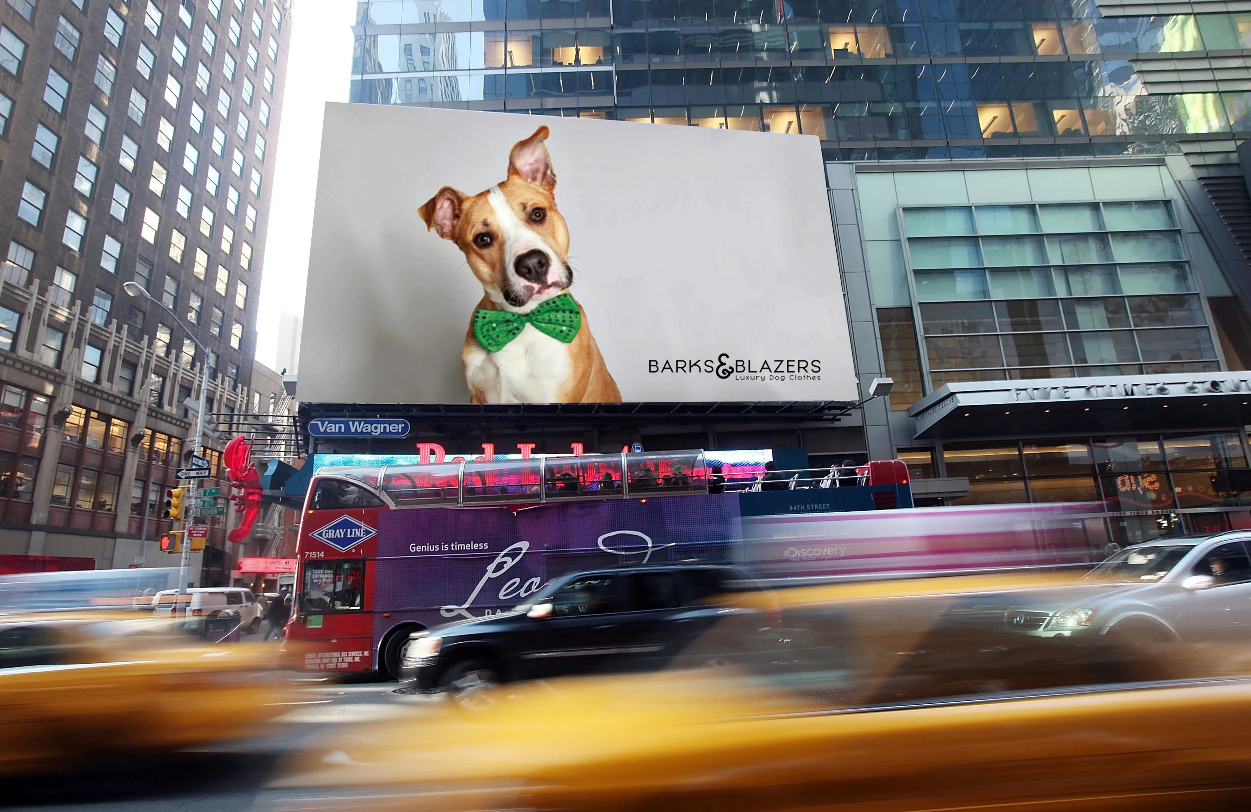  This is a possible billboard mockup for an ad for Barks &amp; Blazers. All advertisements feature dogs wearing an accessory you might not usually see them in. I imagine this billboard in a populated city, like New York, because it screams high fashi