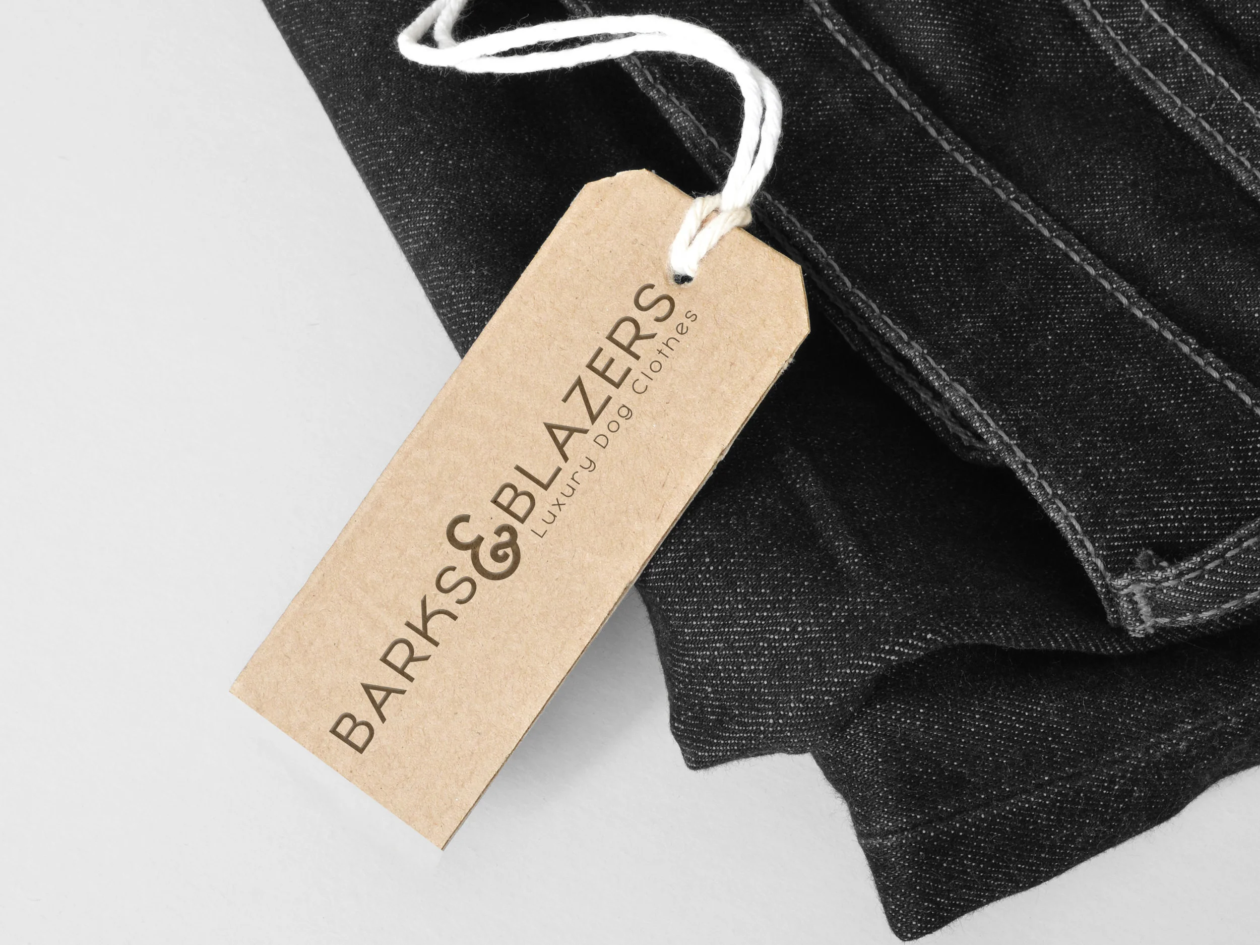  Tag mockup. You don't want a tag on your dog's clothing because they could chew it off, but an ironed on tag in the back of the clothing item makes it look cheap. With these tags, it still looks luxurious, but you can remove it once you buy it so yo