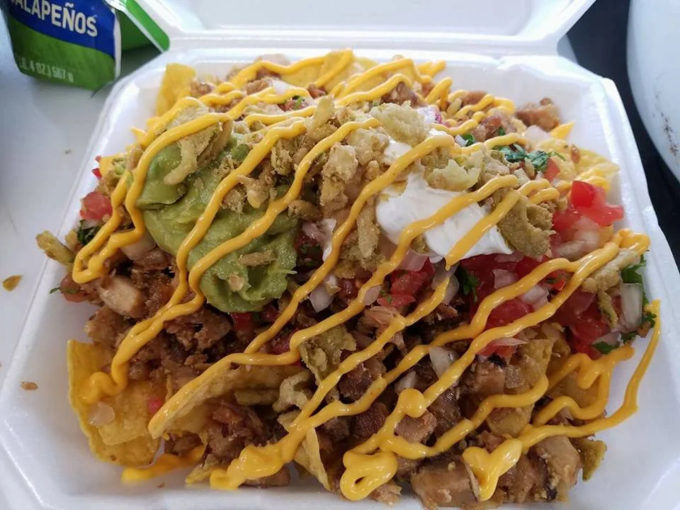Jeepney by Adobo Grill's famous sisig nachos. ( Photo courtesy of Jeepney by Adobo Grill)