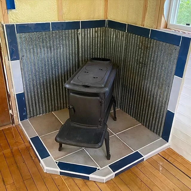We got the hearth and tiling done ✅ Feels good to put in the work and see progress every week.  Everything but the tile is reclaimed.
.
.
.
#52adventures #buildstuff #writersshed #tinycabin #microcabin #writersofinstagram #woodstoves #hearth #reclaim