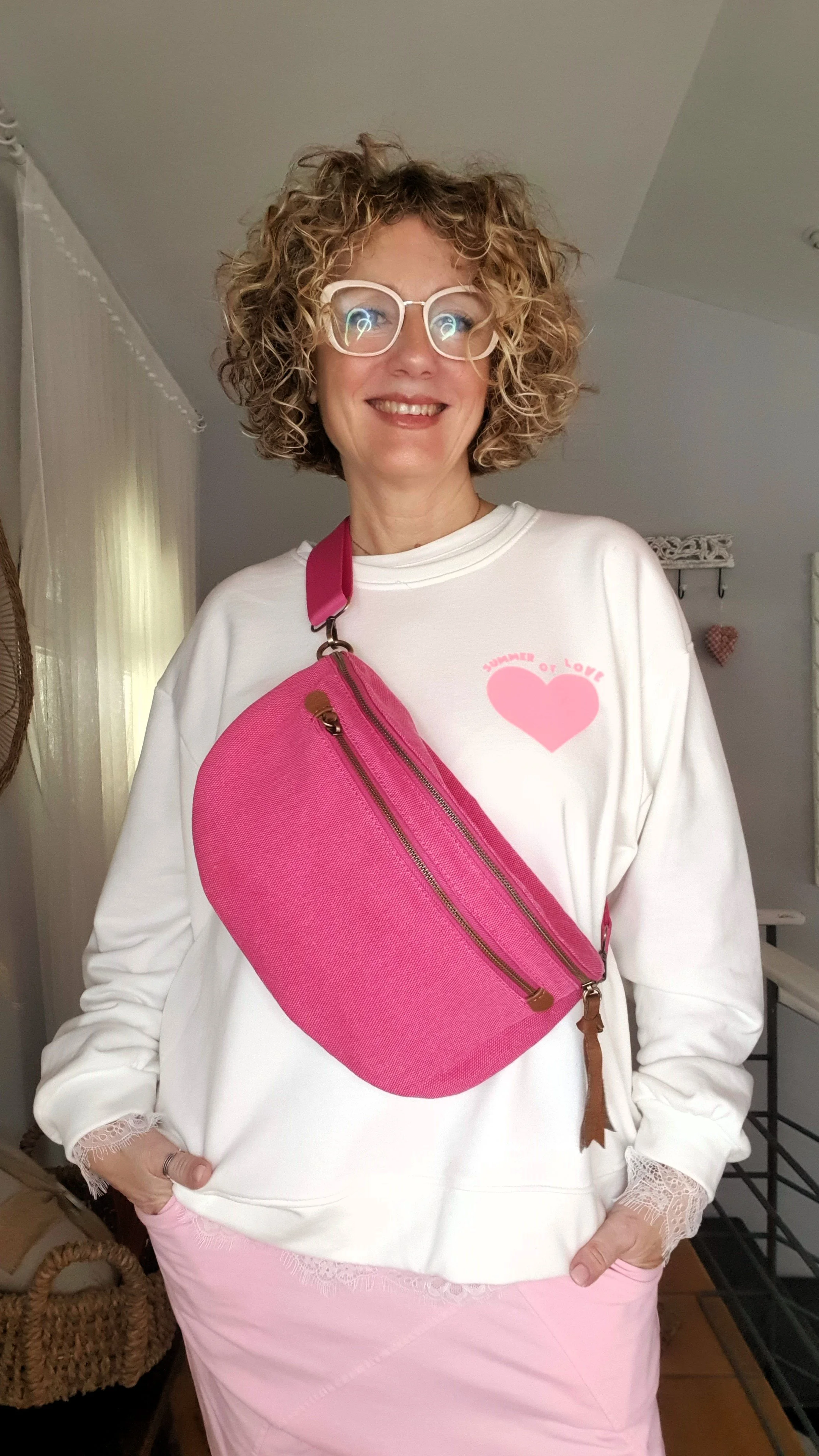 Riñonera cruzada fucsia