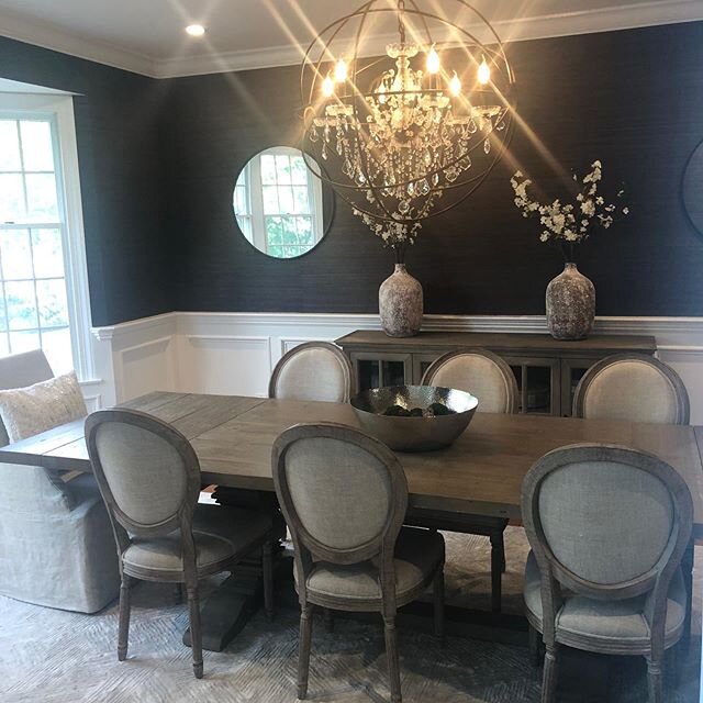Dining Room Transformation. Grasscloth wallpaper, new chandelier, dining room furniture, and moulding and trim installation complete the room.⁠⠀
⁠⠀
#trimyourhouse #diningroom #wallpaper