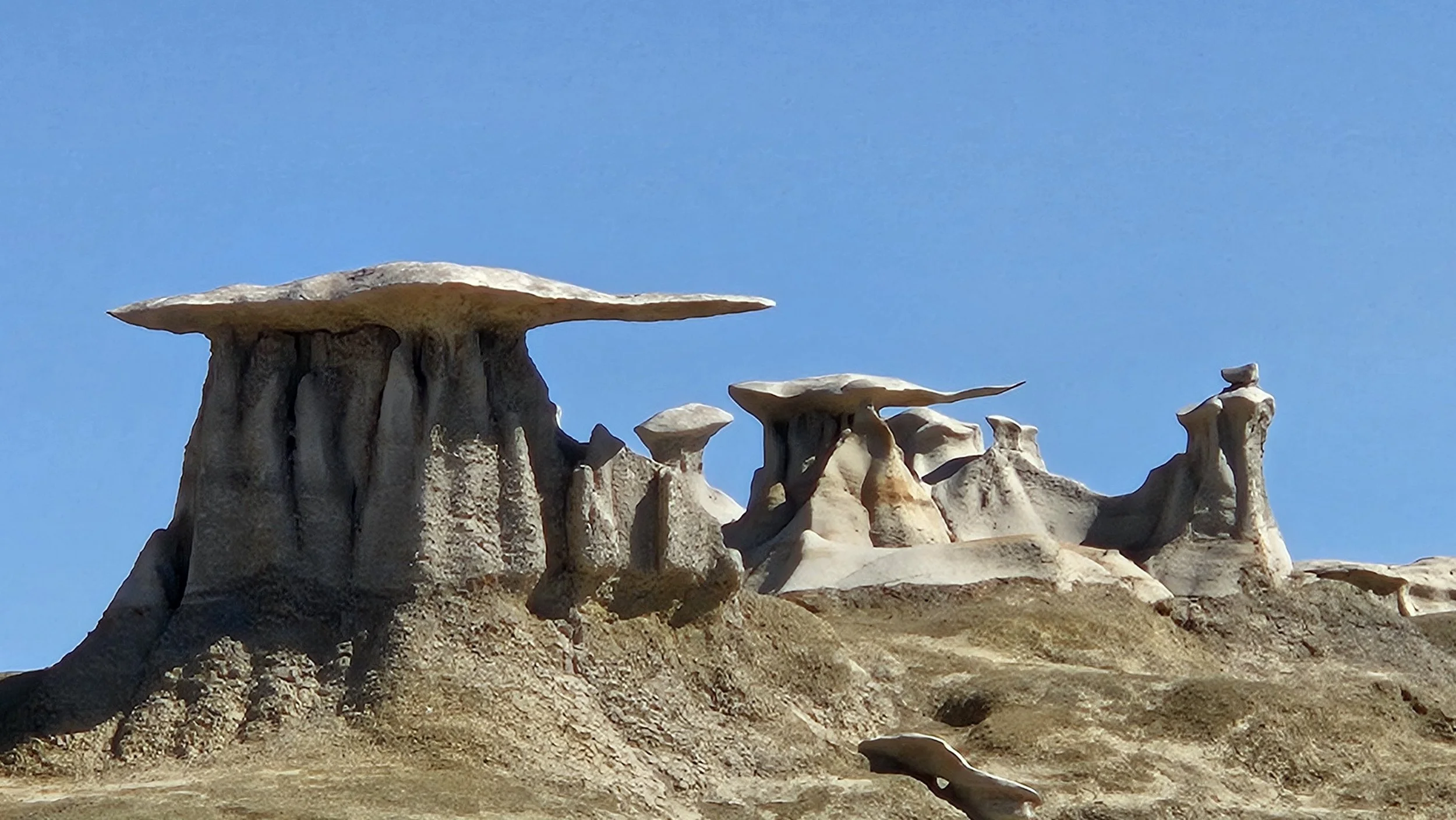Jason Fazio Photography's image of the Three Wings from Bisti Badlands as of 2026.