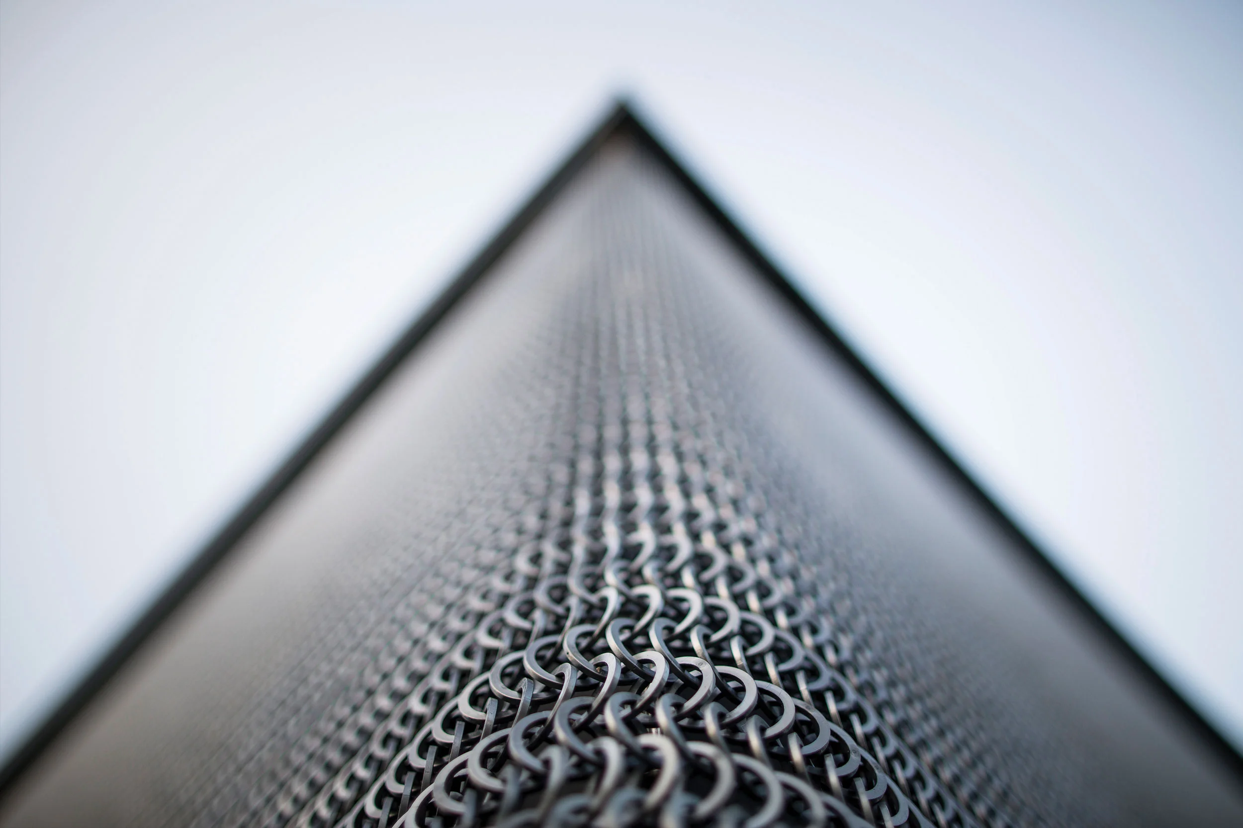 Architizer: There’s something about architectural mesh that makes a building look incredibly covert and cutting edge...
