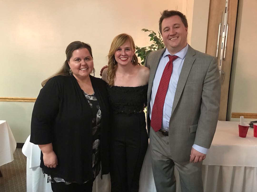 Mackenzie Knox, Executive Officer (center) posing with Directors Dr. Polly Middleton (left) and Chad Reep (right); Source: Marching Virginian, unknown