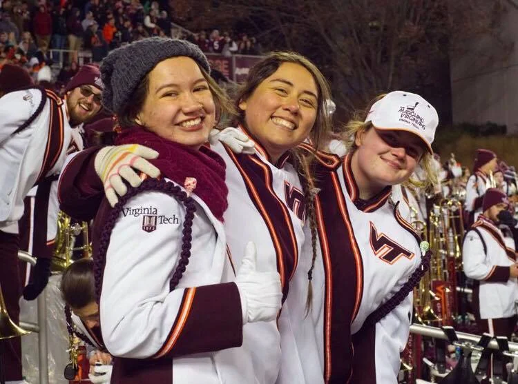 Members of the horn section smiling and creating memories and friendships that will last a lifetime; Source: Facebook