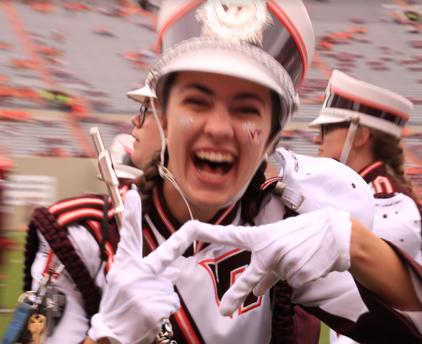 No one brings quite as much spirit to the games as the Marching Virginians; Source: Ashley Deans