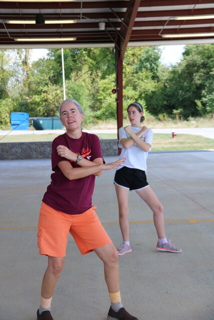 Kelly Sund, who was in town for Fall Family Weekend, and her daughter Clara Hellersund, who plays the trombone in campus band; Source: Emery Poulsen