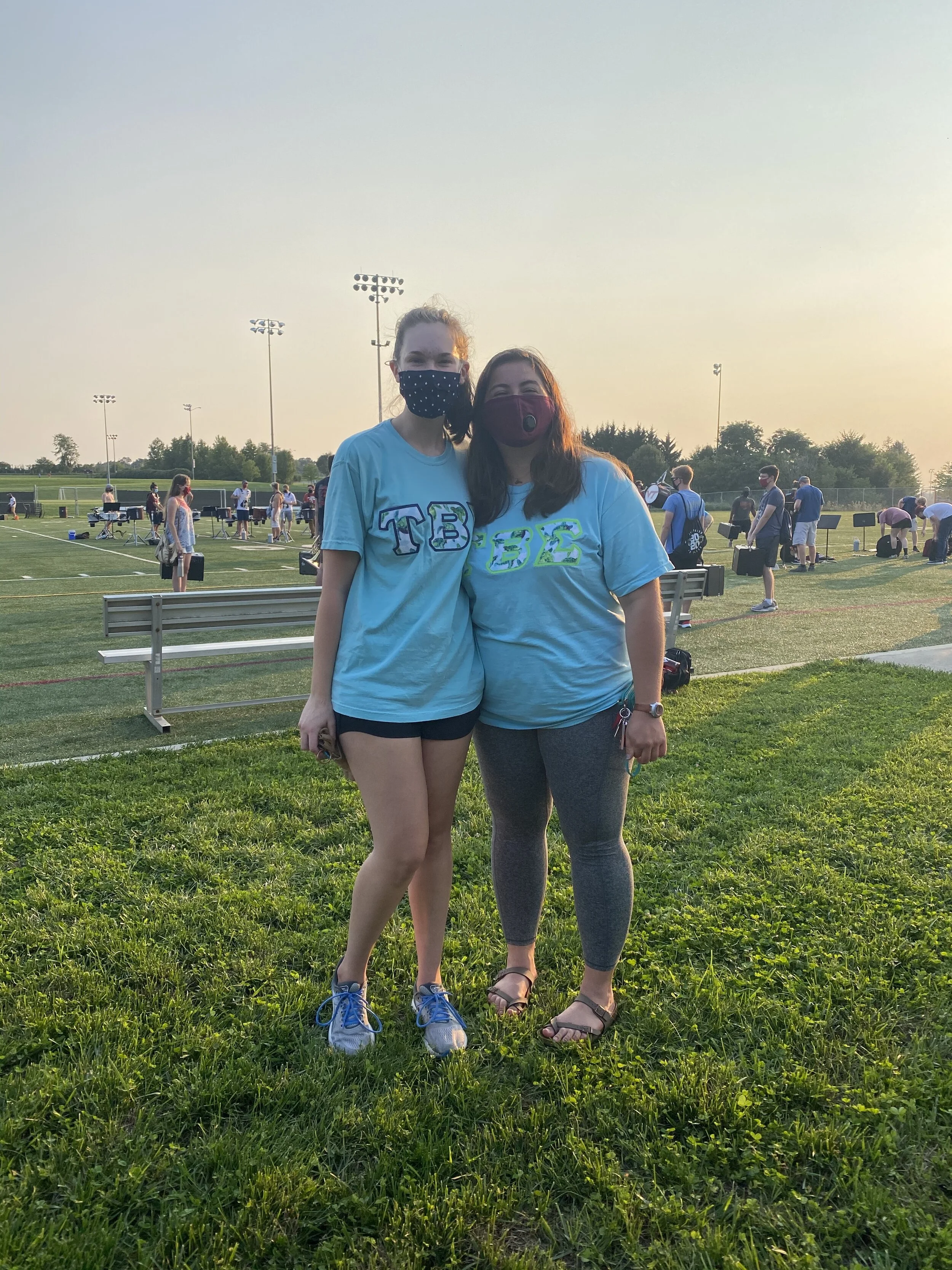 Catherine Miller, left, and Callie Ayala, right, sporting Tau Beta Sigma shirts at practice; Source: Noelle Baxter