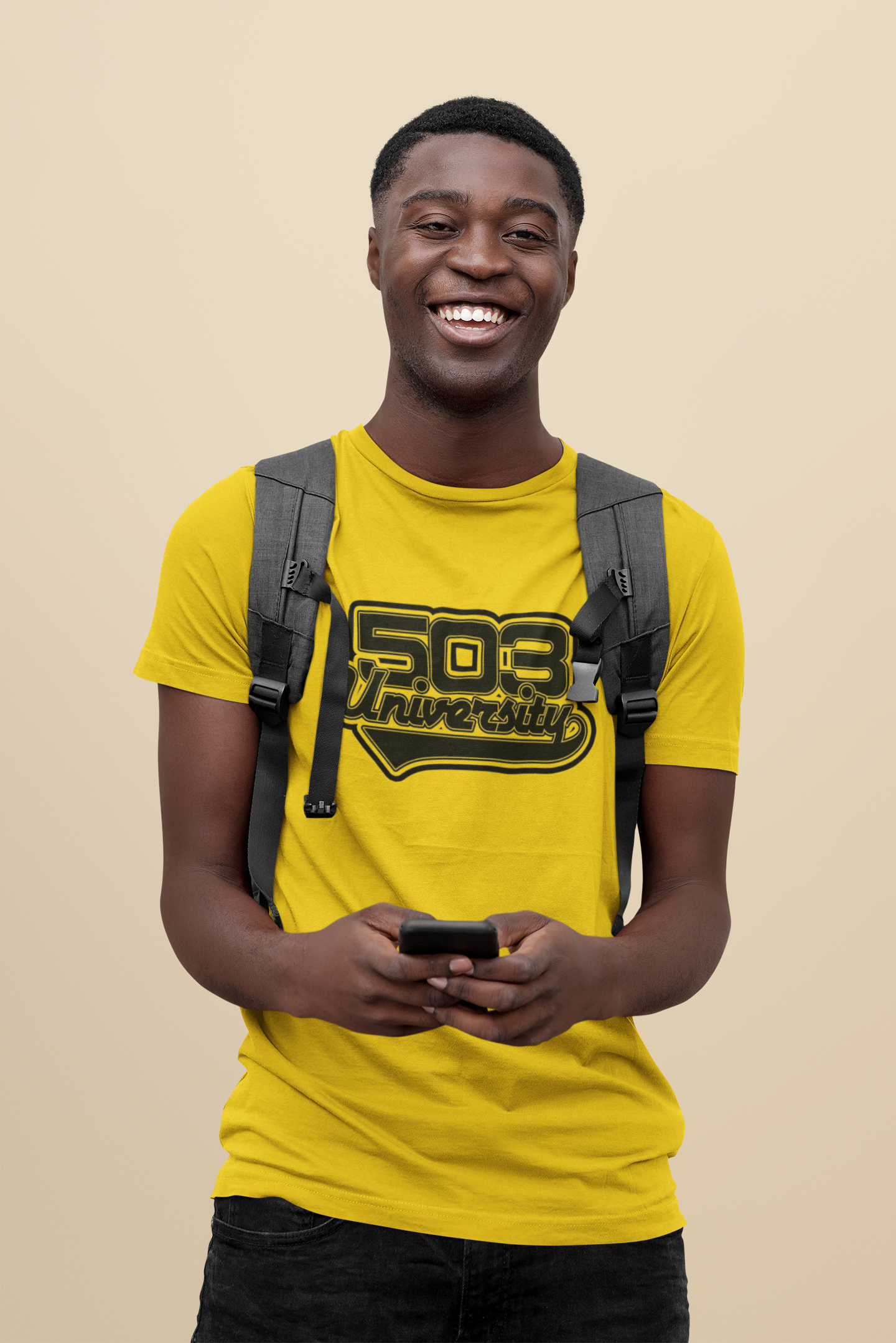 mockup-of-a-college-student-with-a-basic-t-shirt-standing-at-a-studio-43853-r-el2(3).png