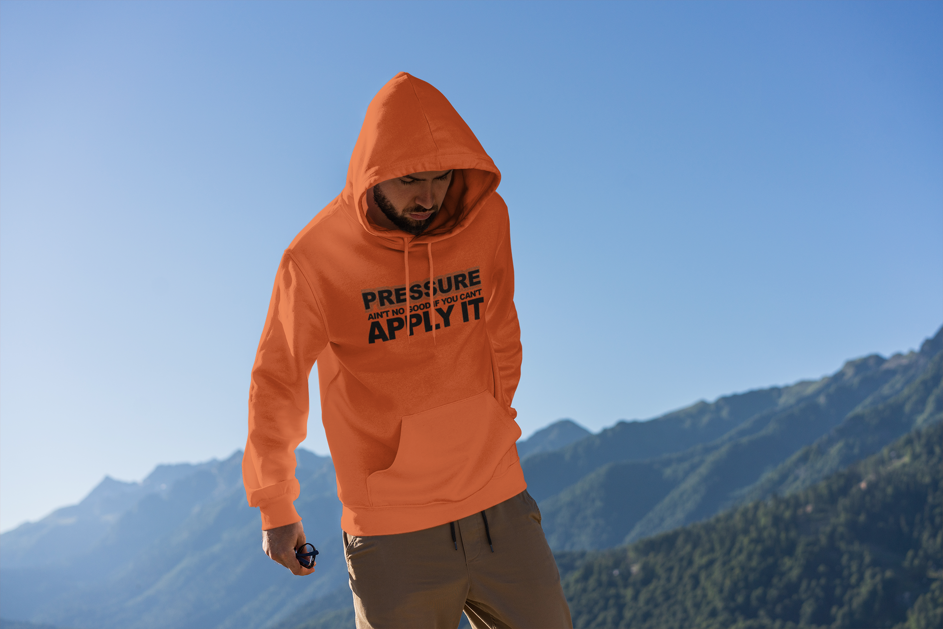 mockup-of-a-man-wearing-a-hoodie-with-mountains-in-the-background-2770-el1(2).png