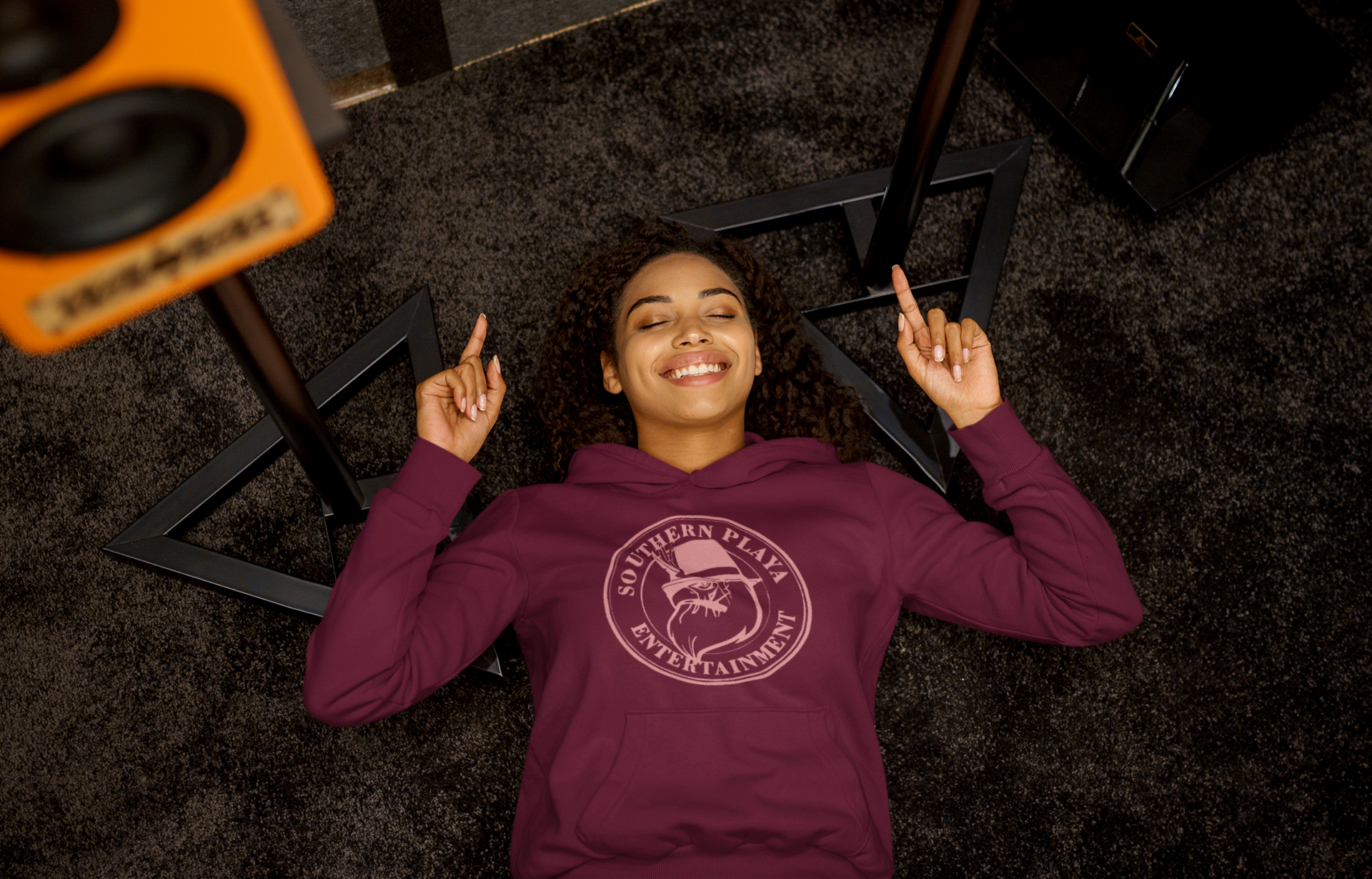 pullover-hoodie-mockup-of-a-woman-listening-to-a-happy-song-while-lying-on-the-floor-m23291-r-el2(7).png