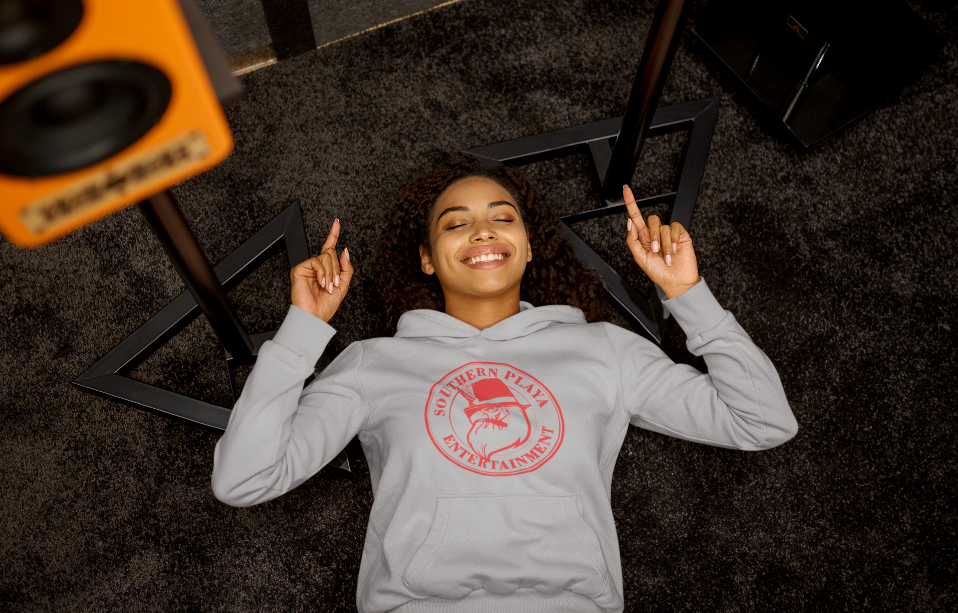 pullover-hoodie-mockup-of-a-woman-listening-to-a-happy-song-while-lying-on-the-floor-m23291-r-el2(5).png