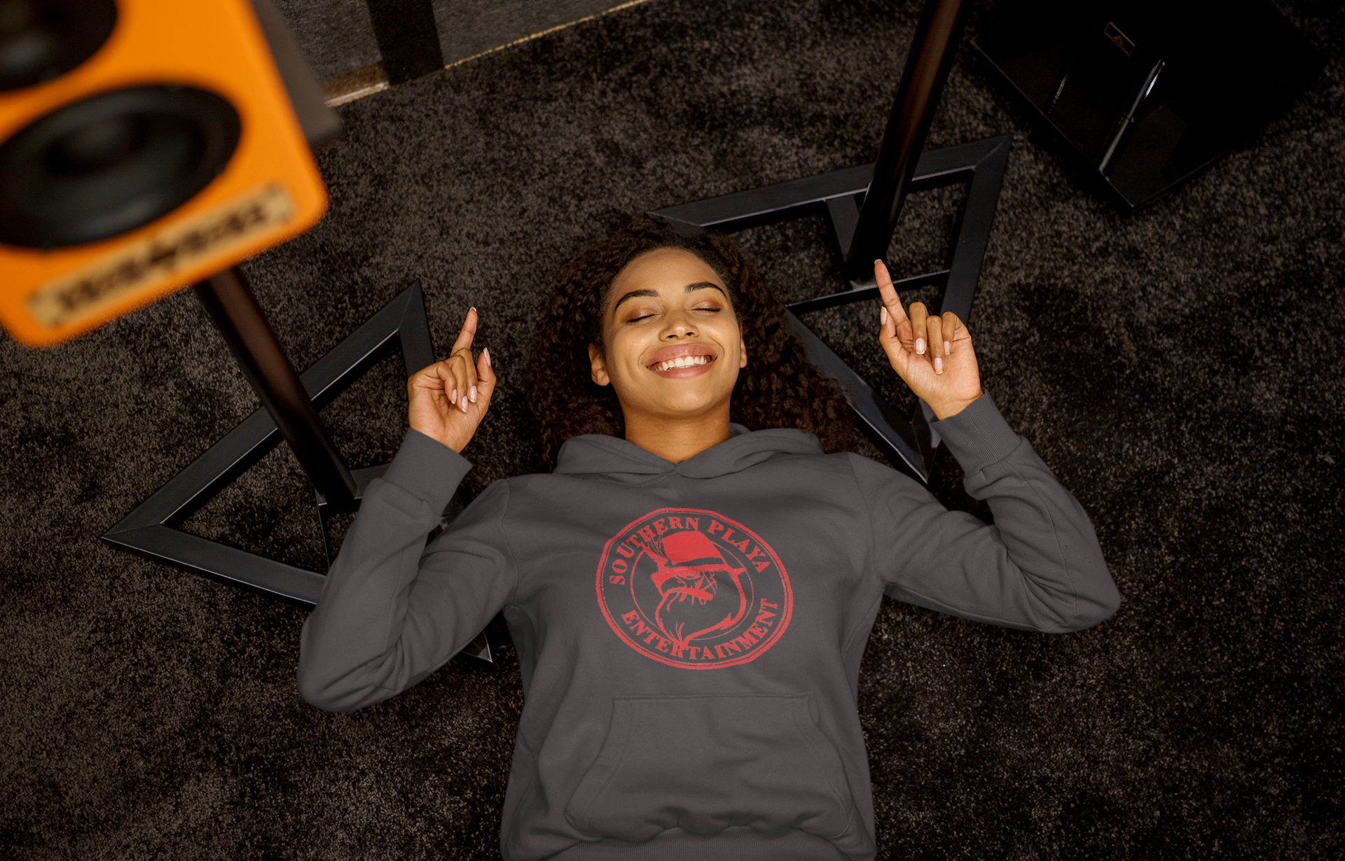 pullover-hoodie-mockup-of-a-woman-listening-to-a-happy-song-while-lying-on-the-floor-m23291-r-el2(3).png