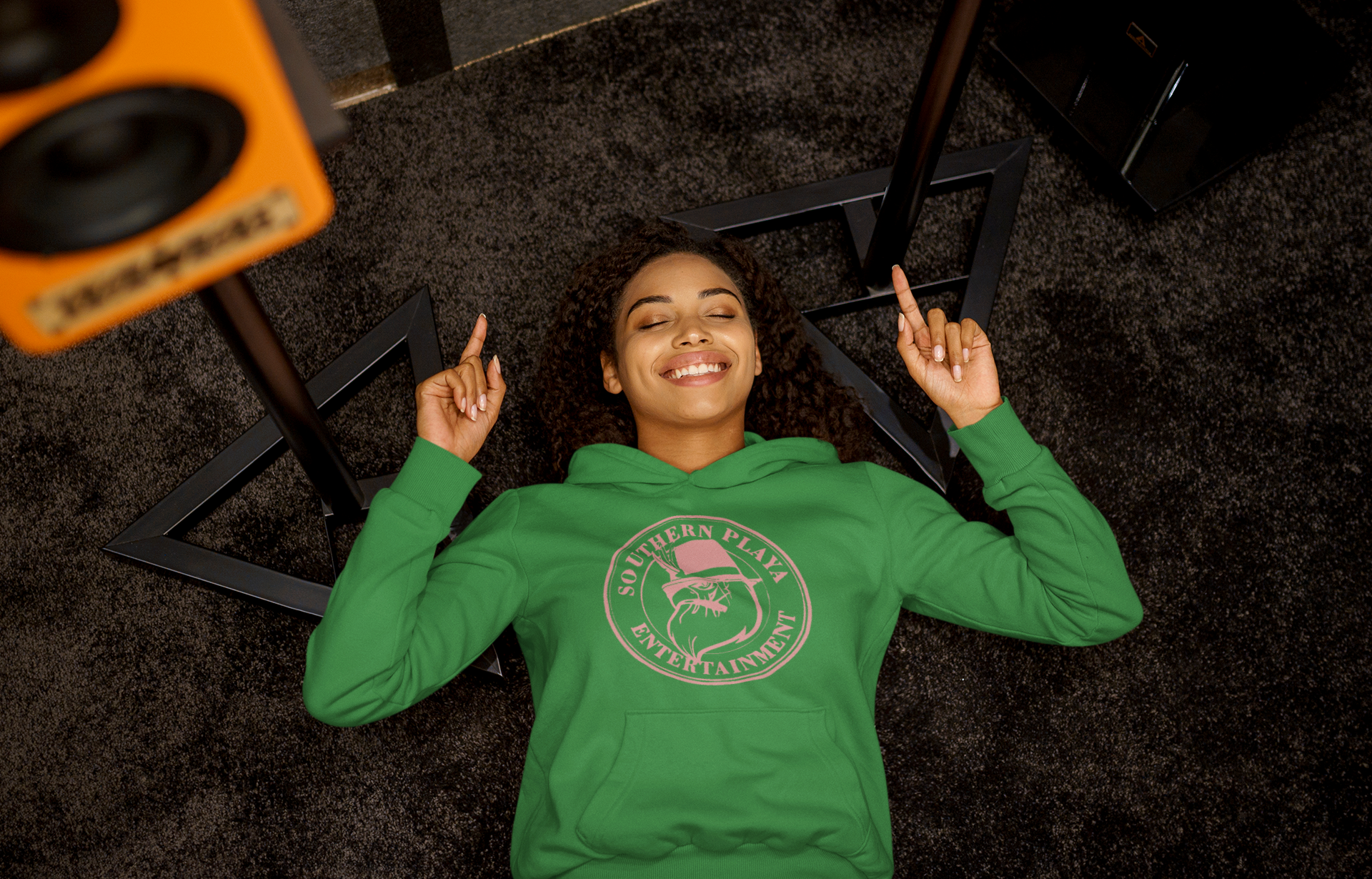 pullover-hoodie-mockup-of-a-woman-listening-to-a-happy-song-while-lying-on-the-floor-m23291-r-el2(6).png