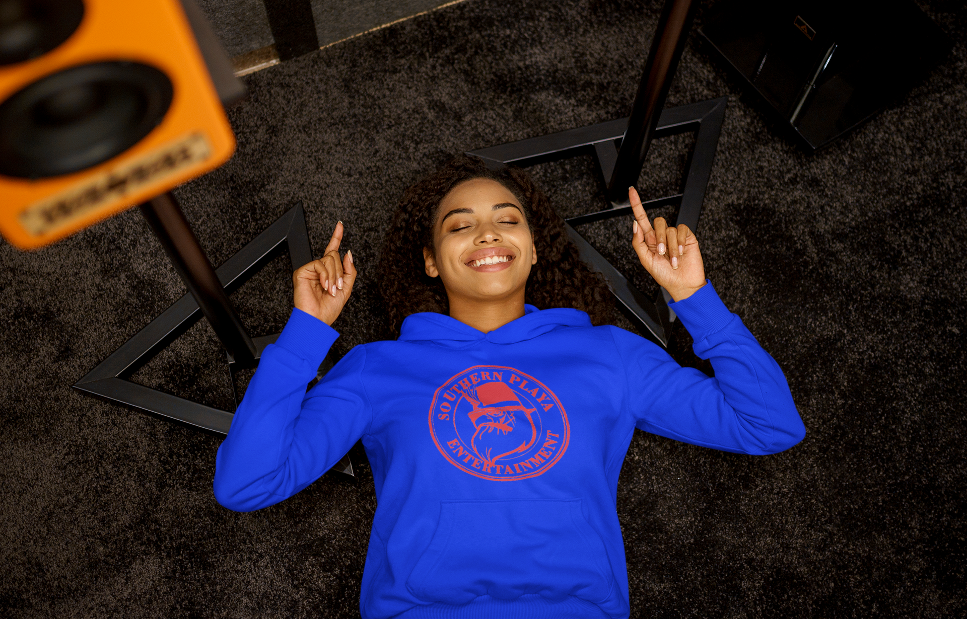 pullover-hoodie-mockup-of-a-woman-listening-to-a-happy-song-while-lying-on-the-floor-m23291-r-el2(4).png