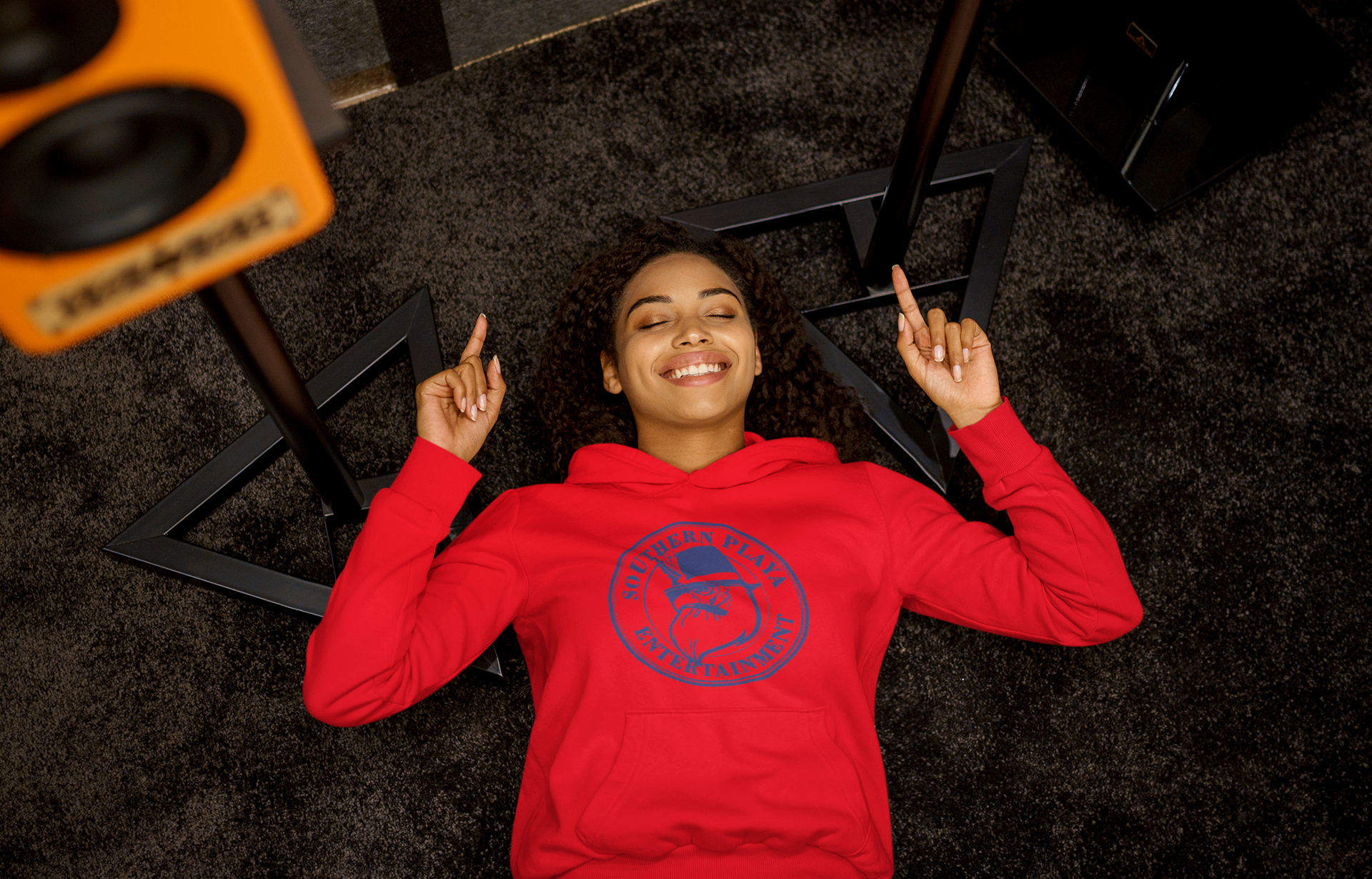 pullover-hoodie-mockup-of-a-woman-listening-to-a-happy-song-while-lying-on-the-floor-m23291-r-el2(12).png