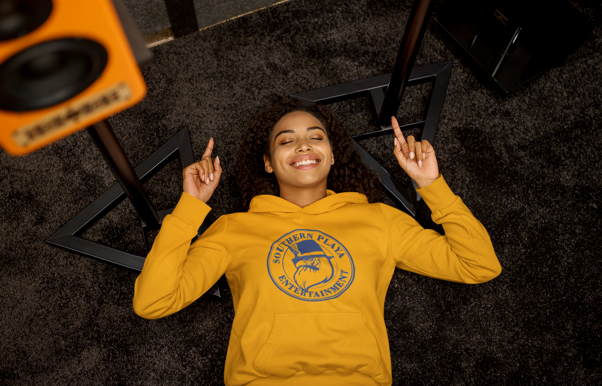 pullover-hoodie-mockup-of-a-woman-listening-to-a-happy-song-while-lying-on-the-floor-m23291-r-el2(11).png