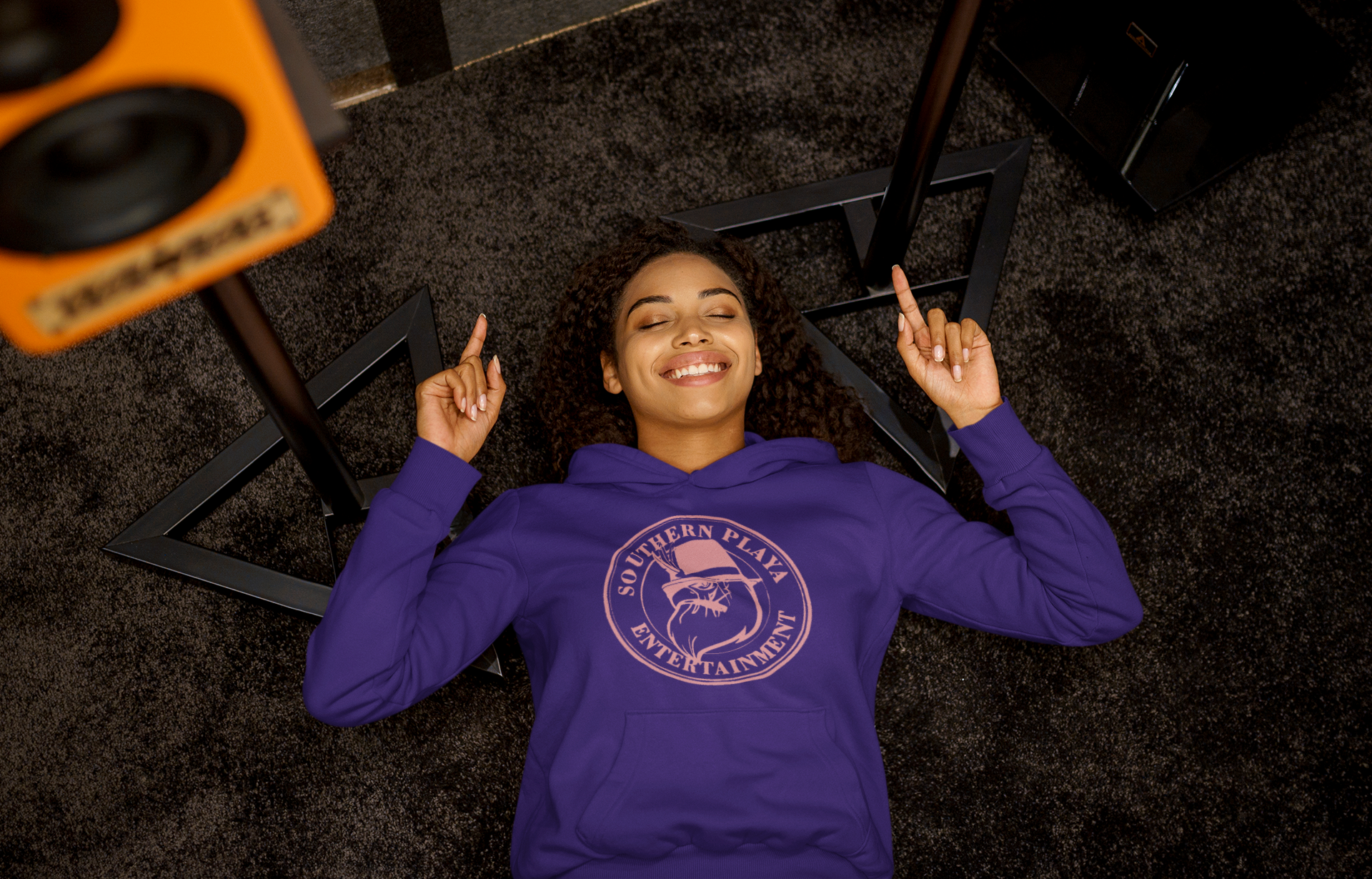 pullover-hoodie-mockup-of-a-woman-listening-to-a-happy-song-while-lying-on-the-floor-m23291-r-el2(8).png