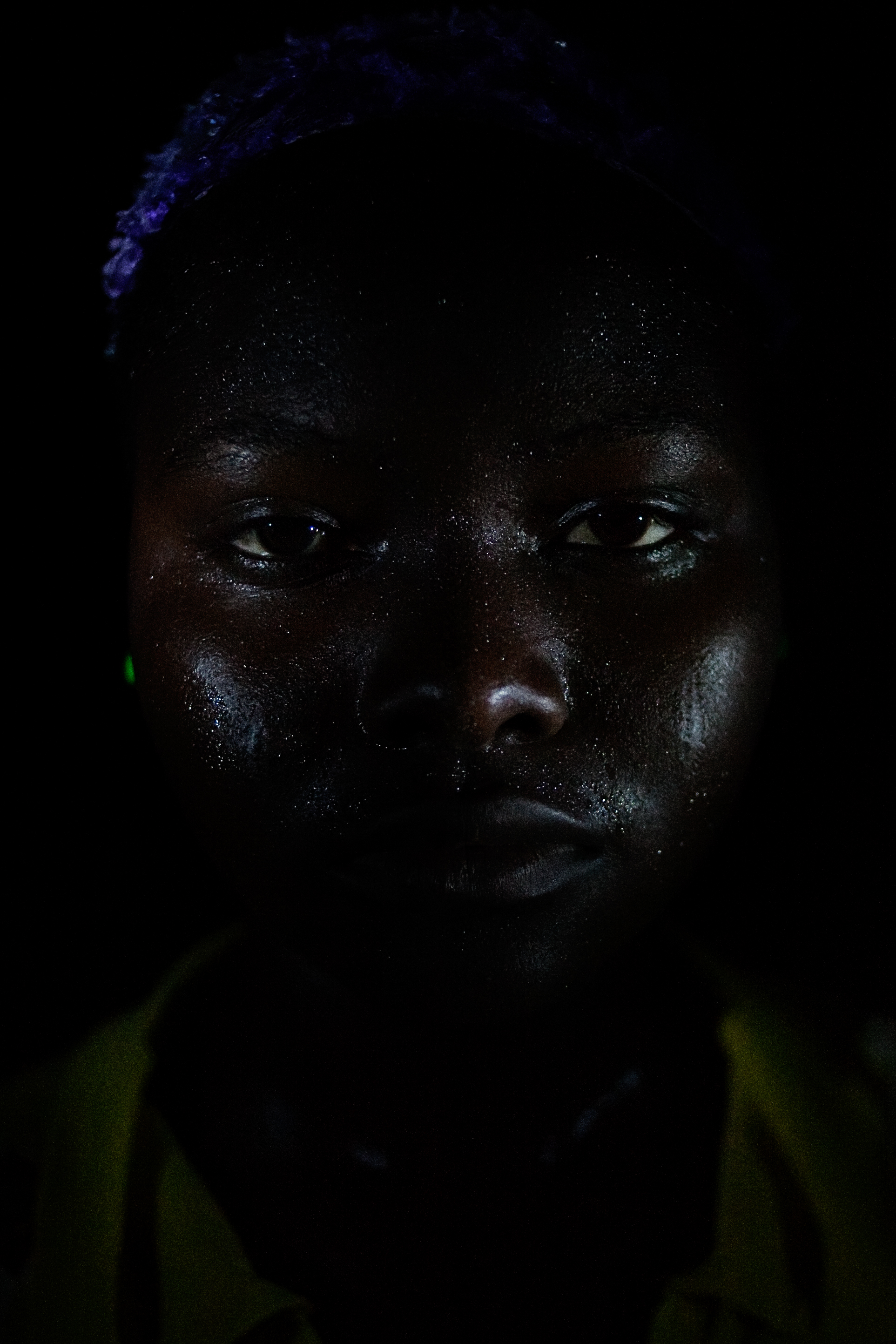  Nasiba Salifu, sweating from dancing, in Voggu, Northern Region, Ghana on Feb. 19, 2010. 