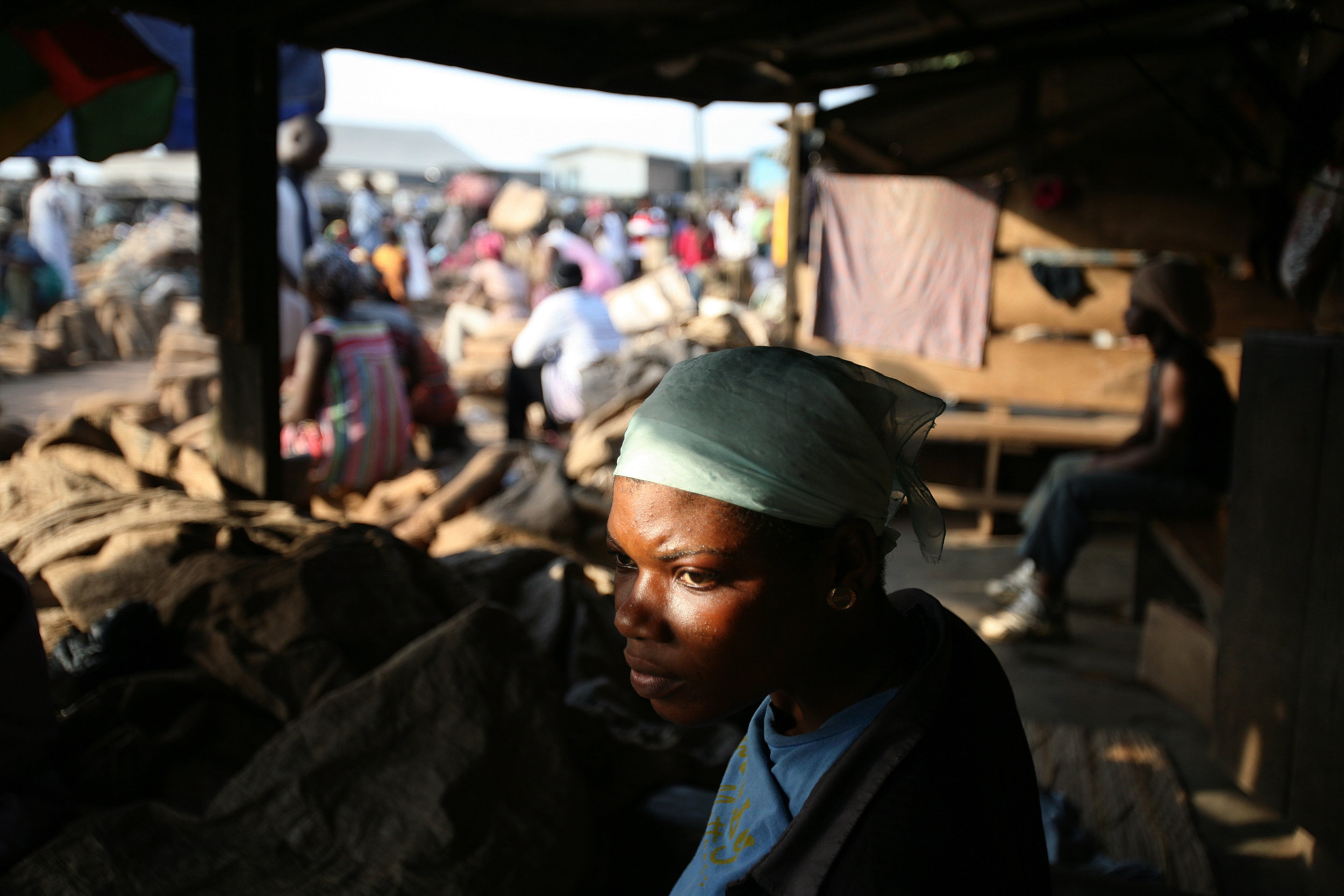  Lamisi sits and waits for work in the yam market in Accra, Ghana on Feb. 11, 2009. 