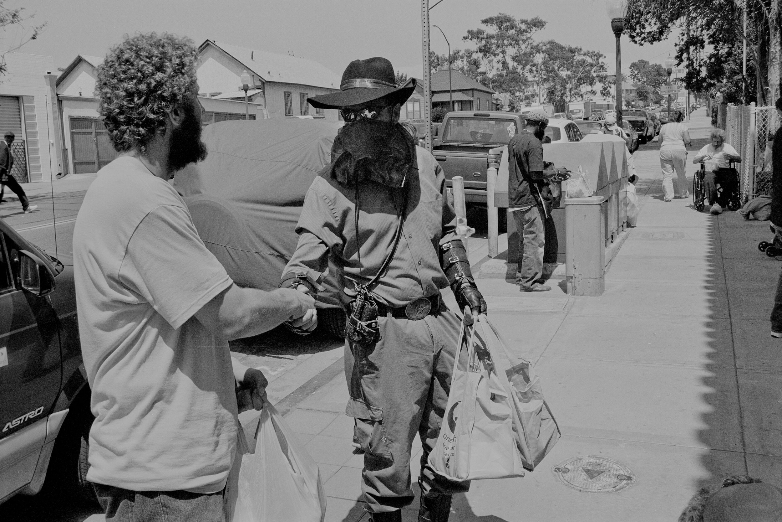  Geist hands out food to unhoused people during HOPE 2012 in San Diego, CA on July 14, 2012. 