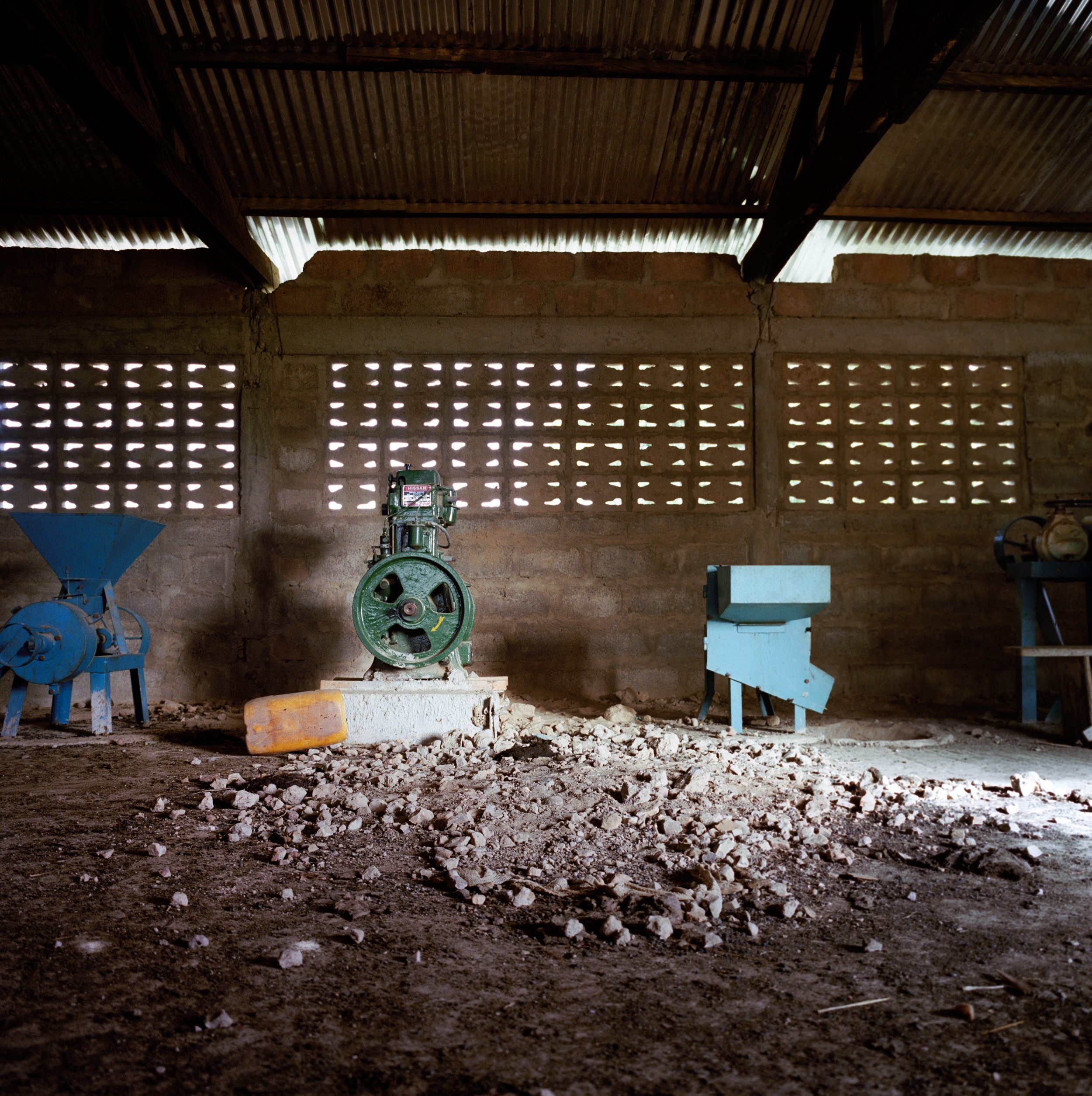  Unused grinding mills. Zuarungu, Upper East Region, Ghana. Photographed June 12, 2014.  The history of the grinding mills in Zuarungu is longer and more convoluted than one might expect — it involves five years of incremental steps in the project, a