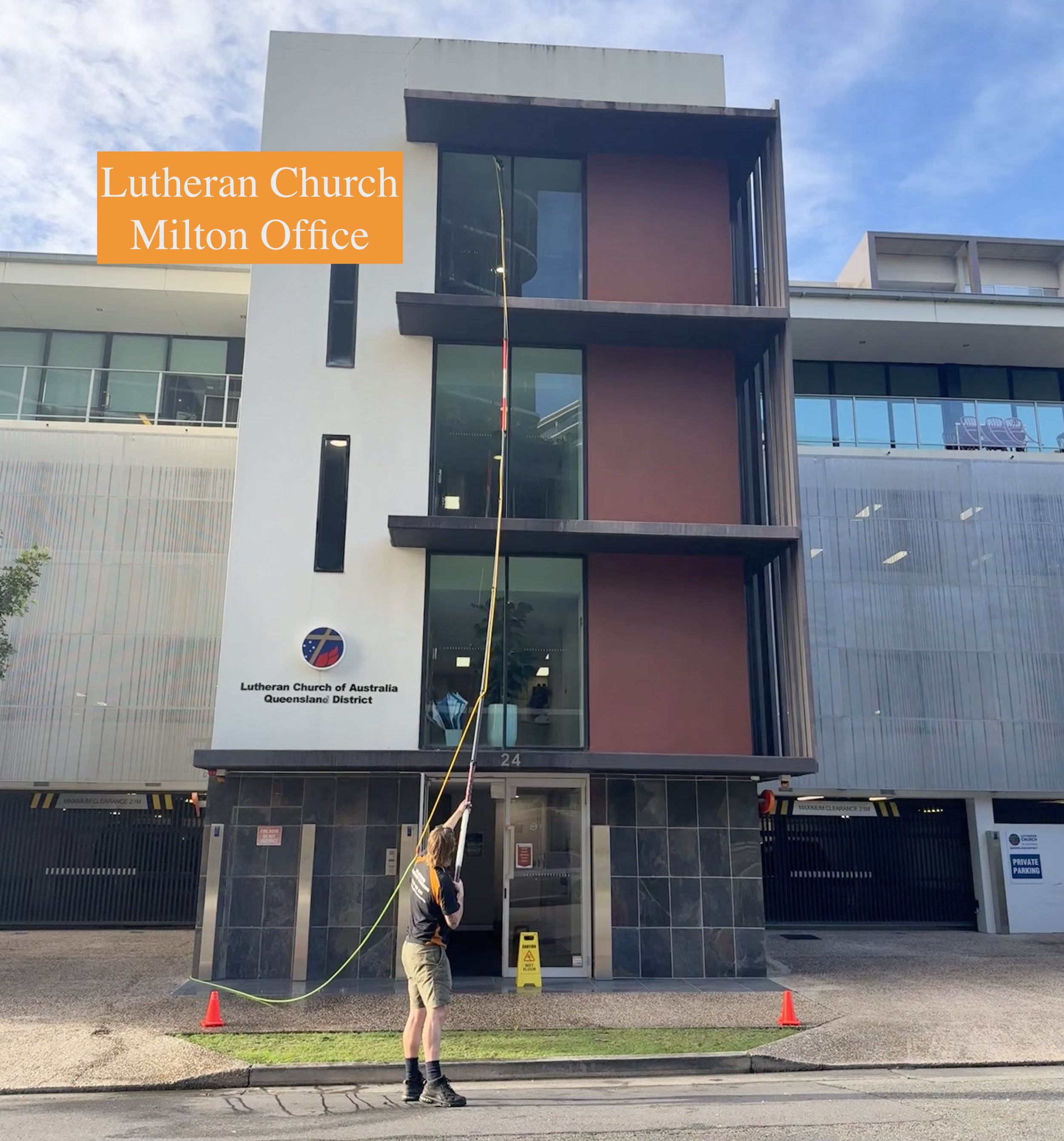 Cleaning the outside windows of a 3 level office building