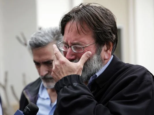 Richard Martinez who says his son Christopher Martinez was killed in Friday night's mass shooting that took place in Isla Vista, Calif., breaks down as he talks to media outside the Santa Barbara County Sheriff's Headquarters on Saturday, May 24, 2014, in Santa Barbara, Calif. (Photo: Jae C. Hong/Associated Press)