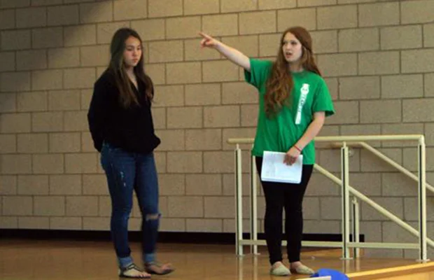 Student leader Sarah Clements walks members of her community through how to write an effective letter to Congress.