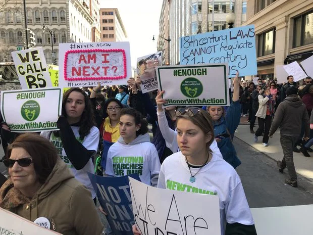 Students and parents from Newtown, Conn., hold signs in Washington during the March for Our Lives event on March 24. FRED LUM/THE GLOBE AND MAIL