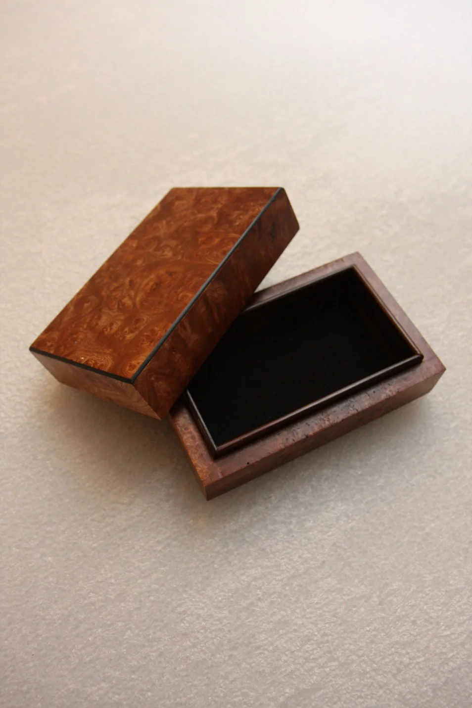 jewellery-box-made-inburr-elm-and-lined-in-ebony.jpg