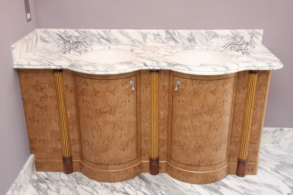 bow-fronted-vanity-cabinet-in-burr-oak-with-gilded-columns.jpg