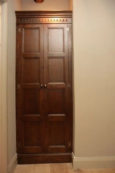 Fitted-oak-cupboard-with-four-panel-design.jpg