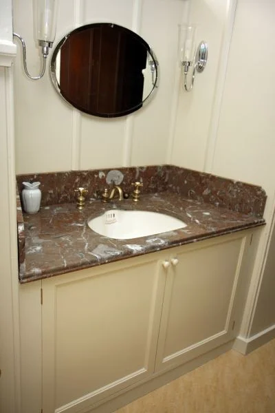 Painted sink cabinet in tulip wood for Aldourie Castle.jpg