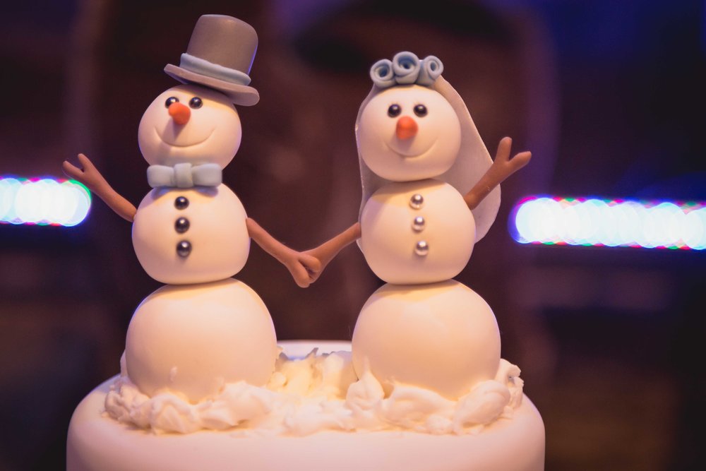 Close up image of weeding cake toppers