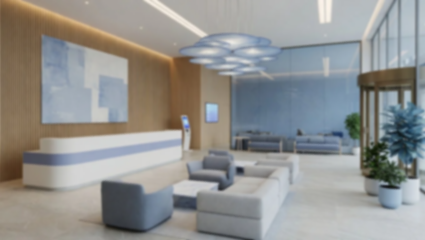 Modern hotel lobby with a sleek white and blue reception desk, contemporary gray seating area, large abstract wall art, statement chandelier lighting, and potted plants in a bright, open space with marble-style flooring.