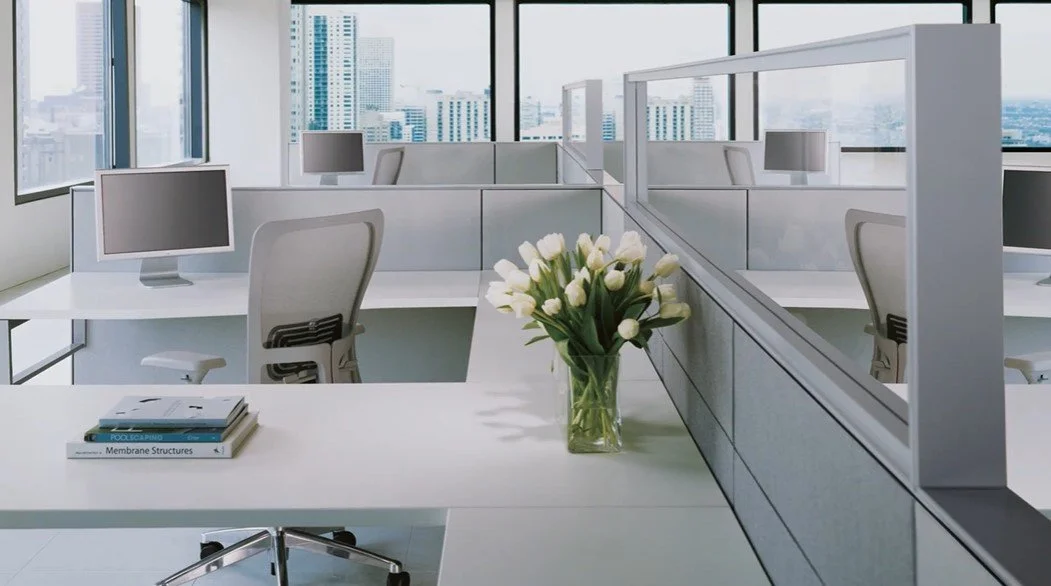 Modern office cubicle with integrated glass panel
