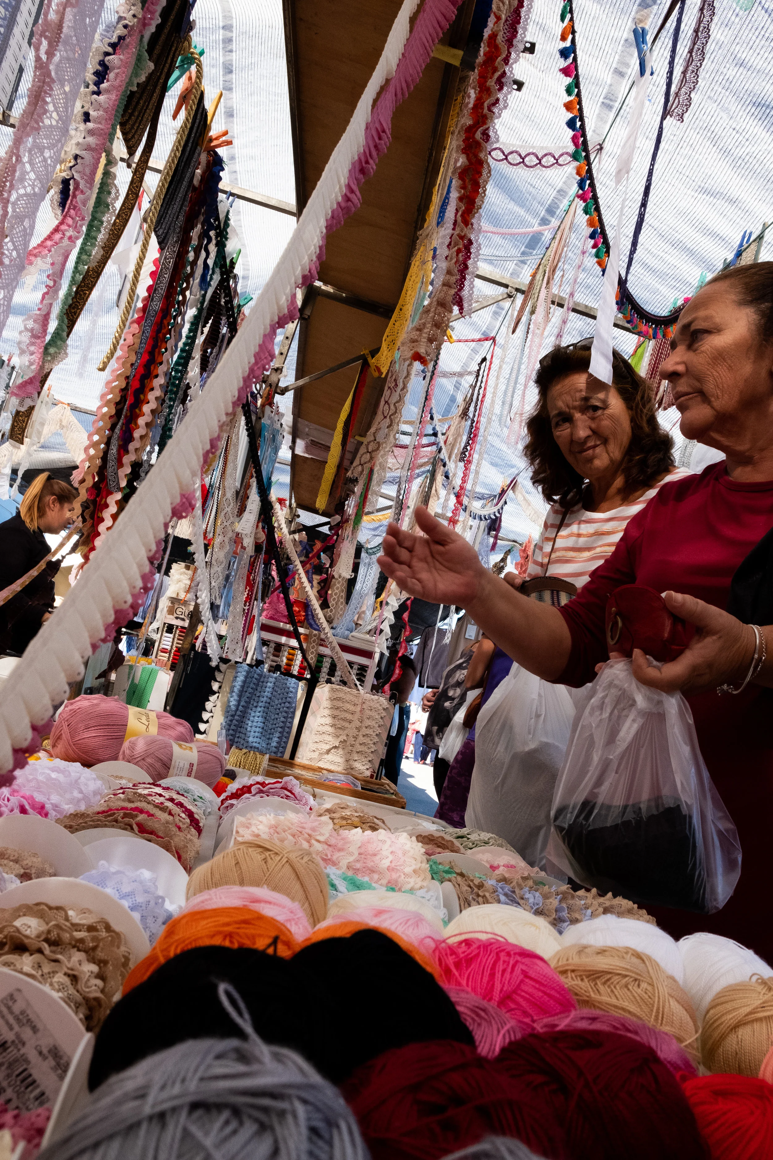 Yarns and ribbons at the gypsy market in Rota.