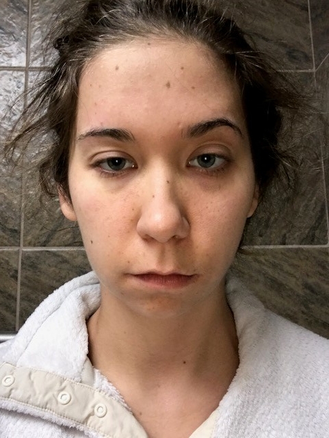 In a gas station bathroom, struggling to get through the drive from Michigan to Chicago.