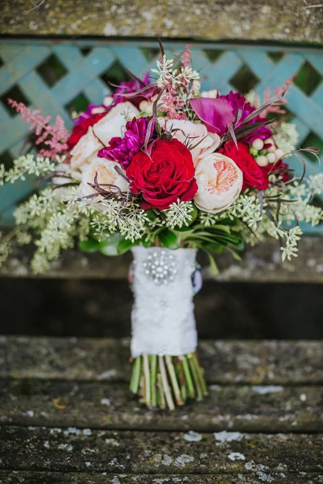Windy City Production BTW the lace wrapped in her bouquet is from her mom's wedding dress! The SWEETEST Details!