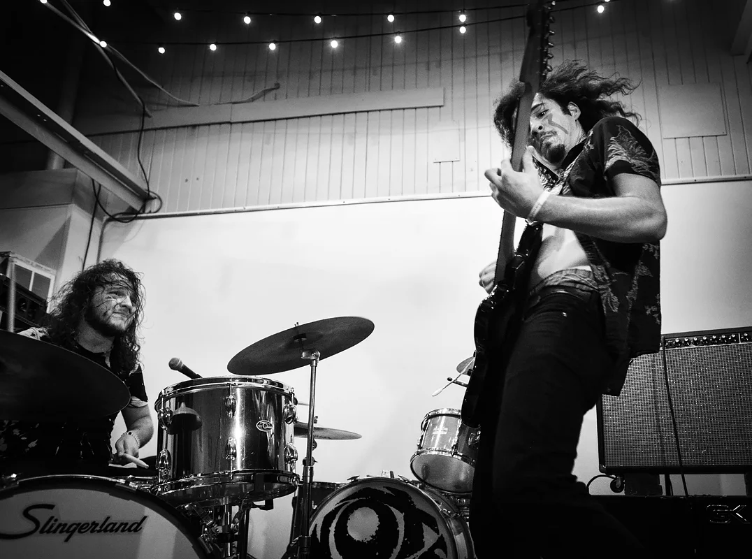 J.J Young, on drums, and Giovanni Orsini rip it up as the band Fortune Teller