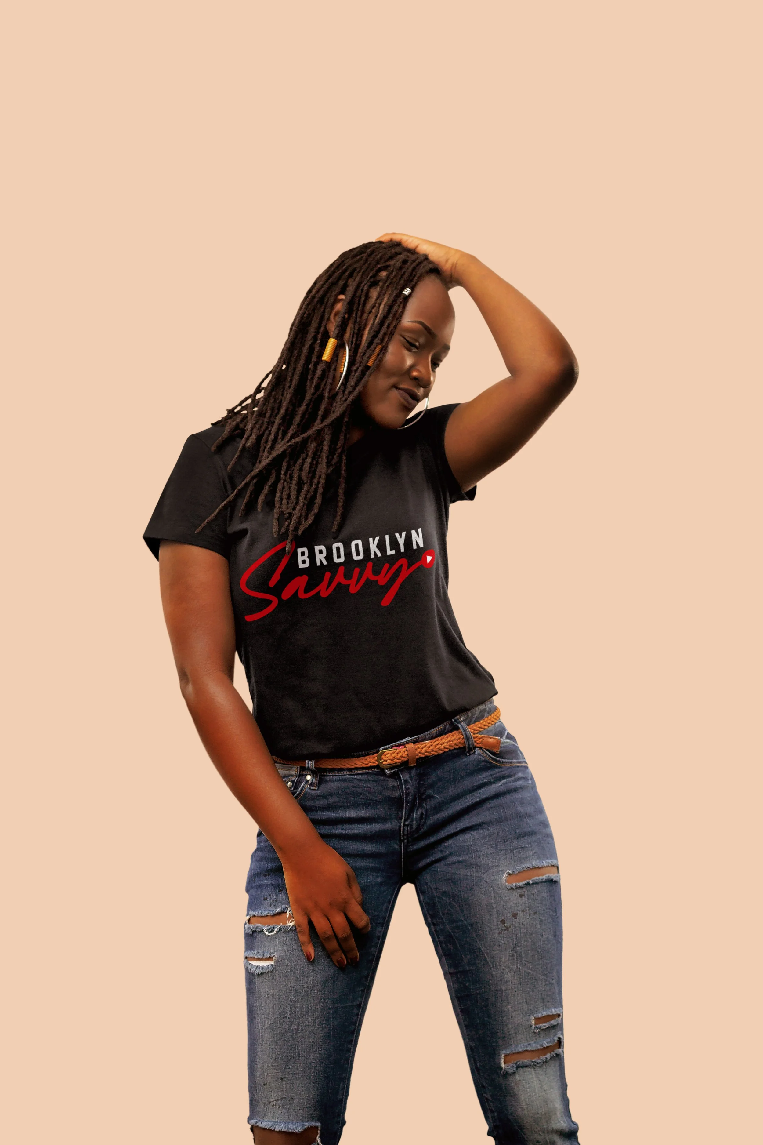 Mockup of a Dreadlocked Black Woman Wearing a Black T-shirt Smiling Posing and Dancing in Studio Background.jpg
