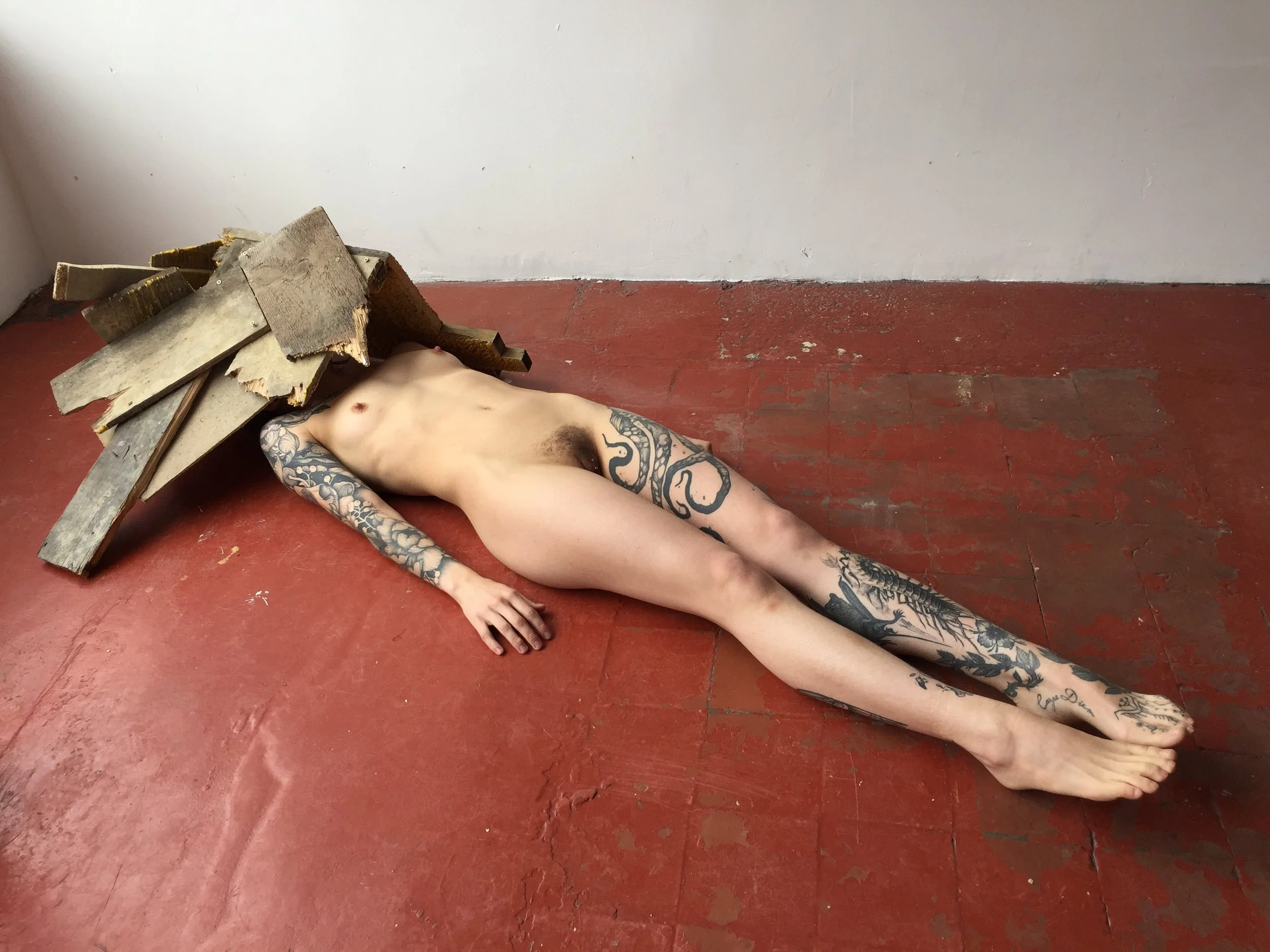  The artist stayed still under her shelter for as long as she could, taking in its healing and protection then, after a non-specified amount of time, got up and silently left the space. 