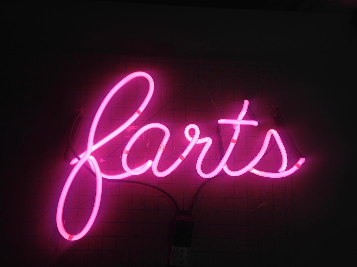 farts, but like in a cute way....pink neon on the bench getting marked for mounting points. #neon #neonsign #neonlights #art #design #lightingdesign #pvdneon