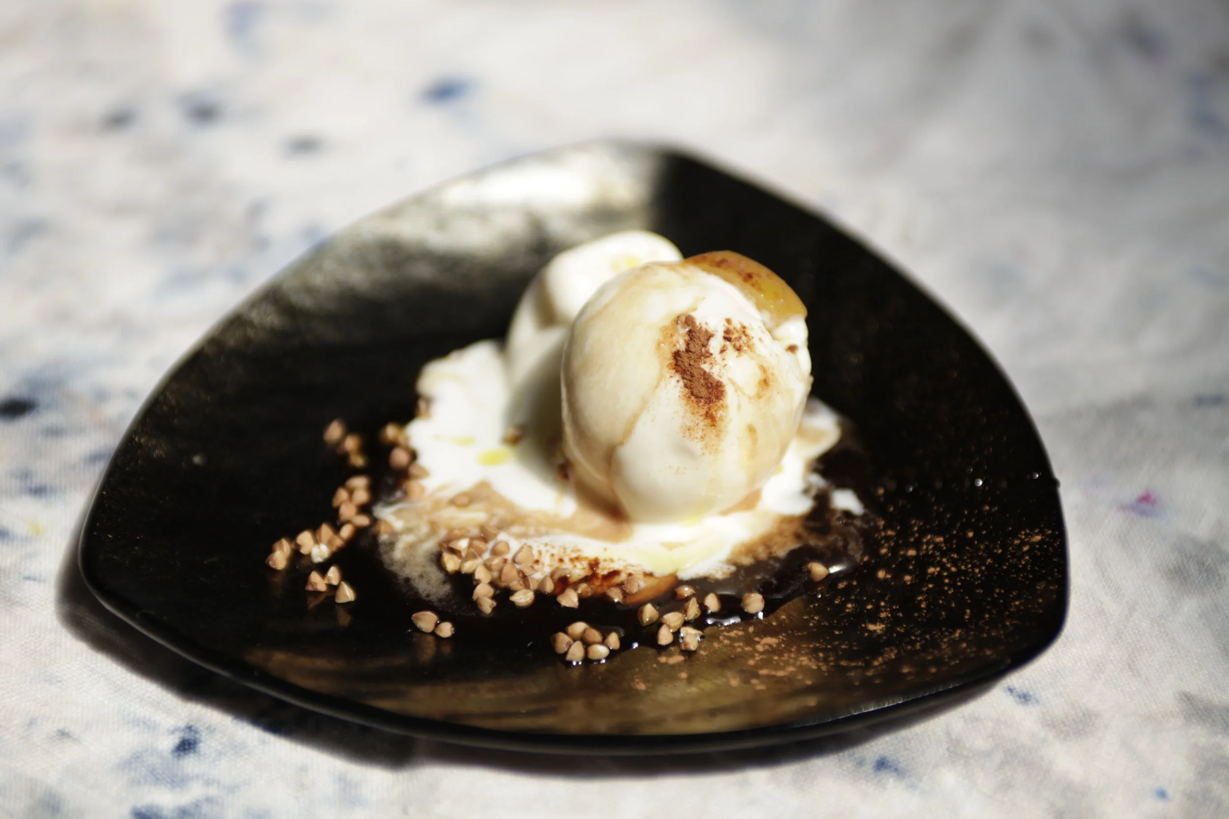 Preserved Lemon Frozen Labne with Buckwheat, Amaranth, Olive Oil, Carob Molasses, Mesquite Powder