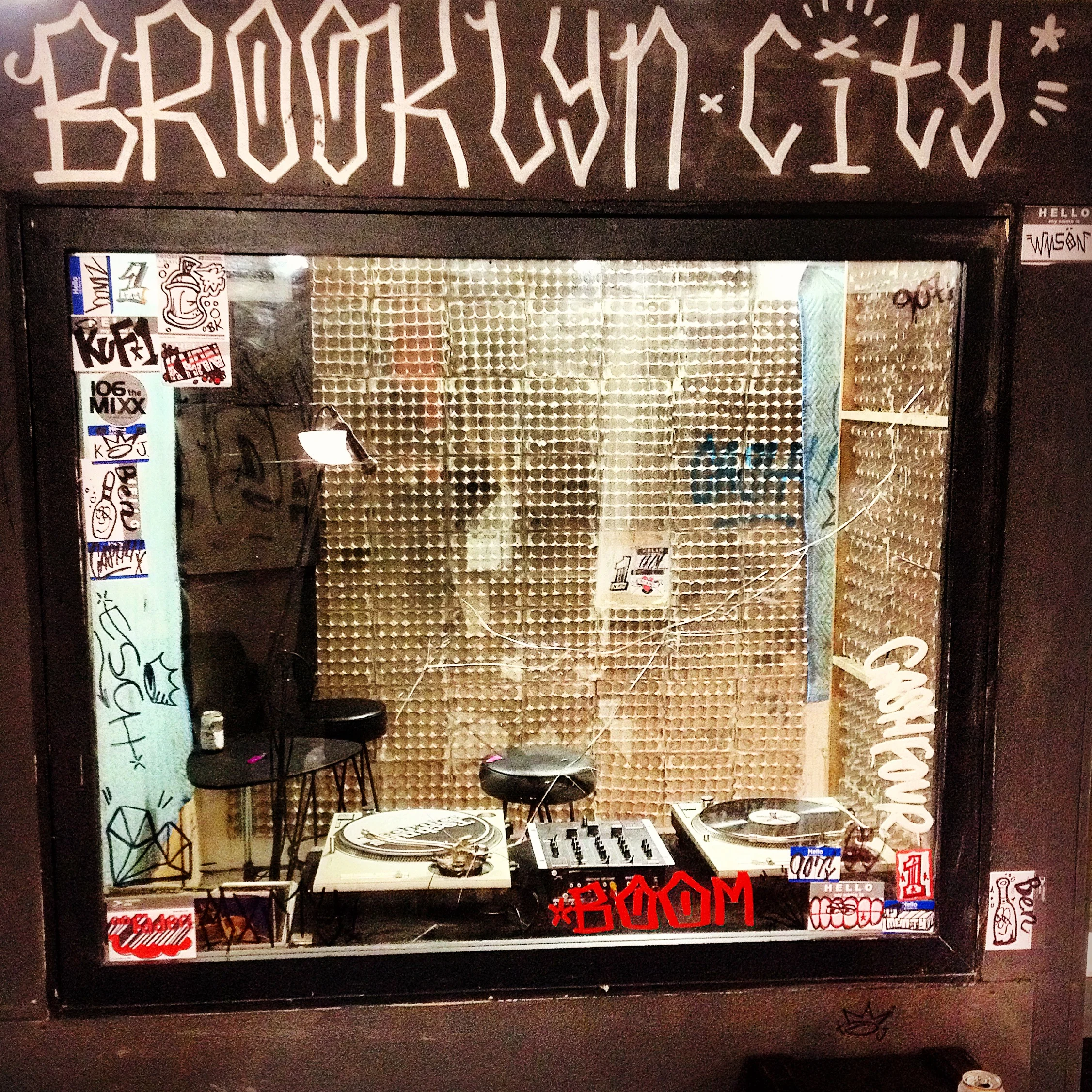  WHEELS (2018) DIR. PAUL STARKMAN,  GRAFITTI AND STICKERS ON RADIO STATION DJ BOOTH 