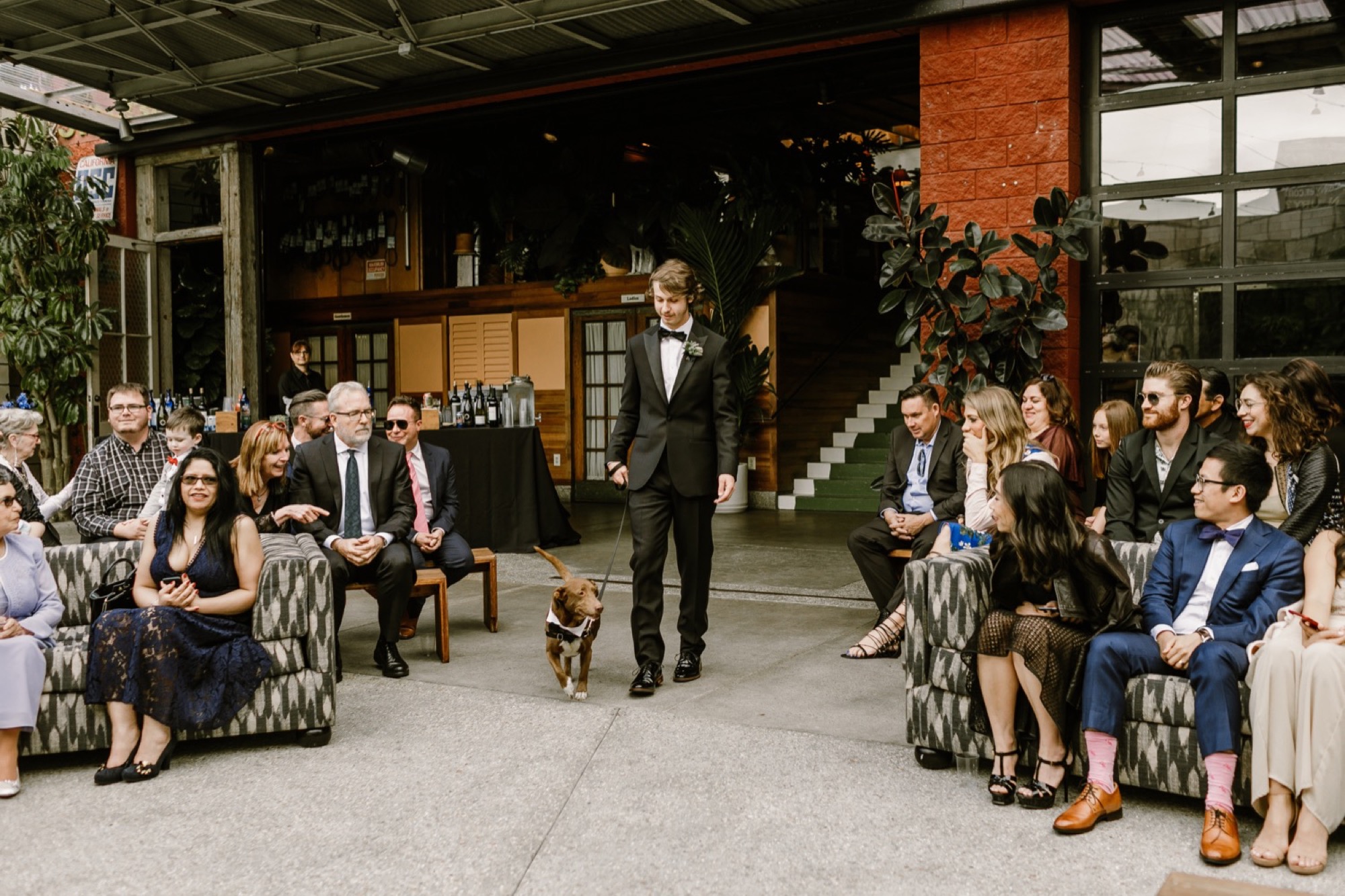 30_Brittany and Chance Wedding-258_groomsmen_down_walking_aisle.jpg