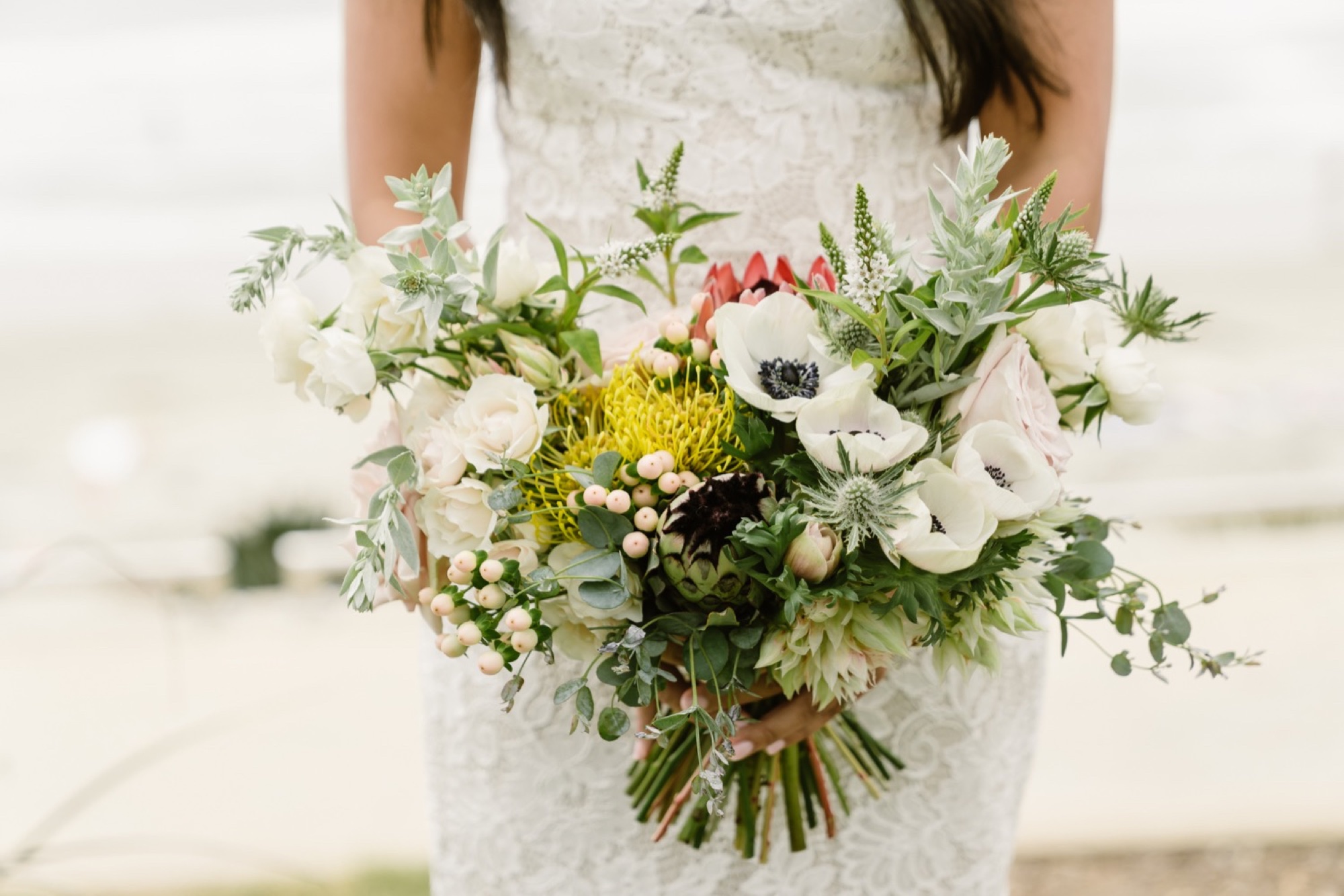 023_Moira and Nate's Wedding-234_bouquet_and_bride.jpg